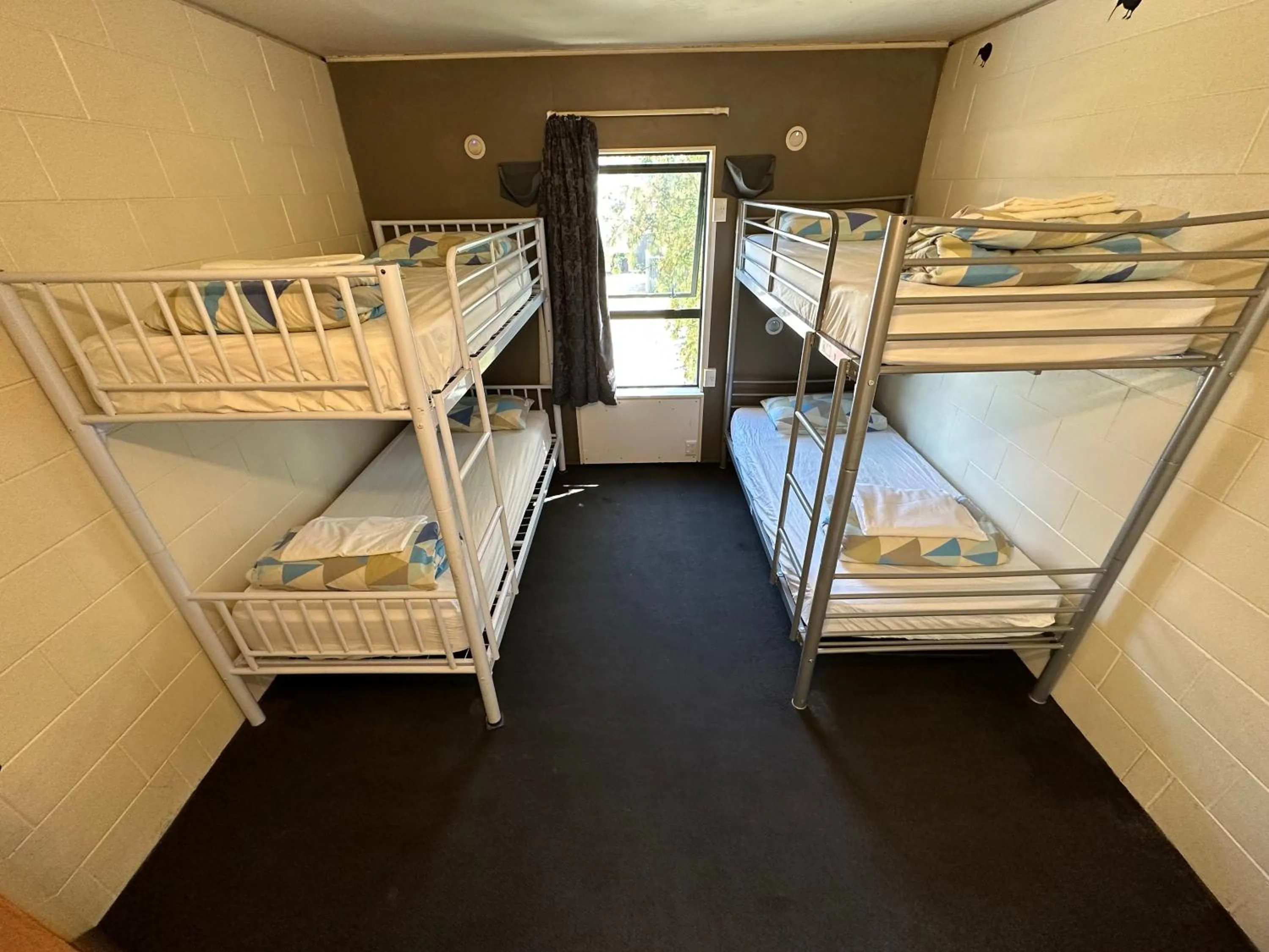 Bed in Around The World Backpackers