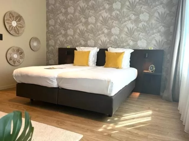 Bed in Bloomhotel