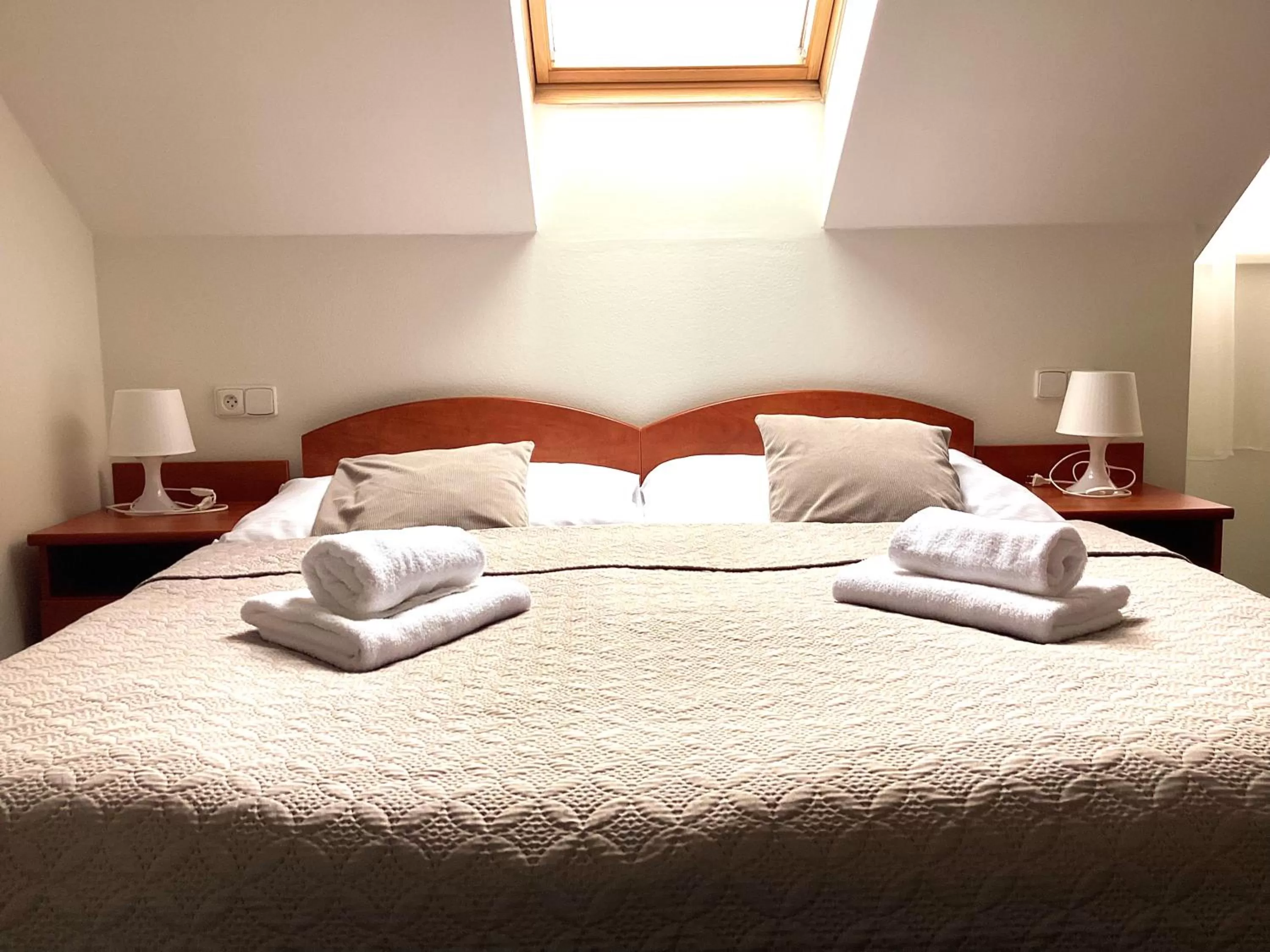 Bed in Hotel Karolina