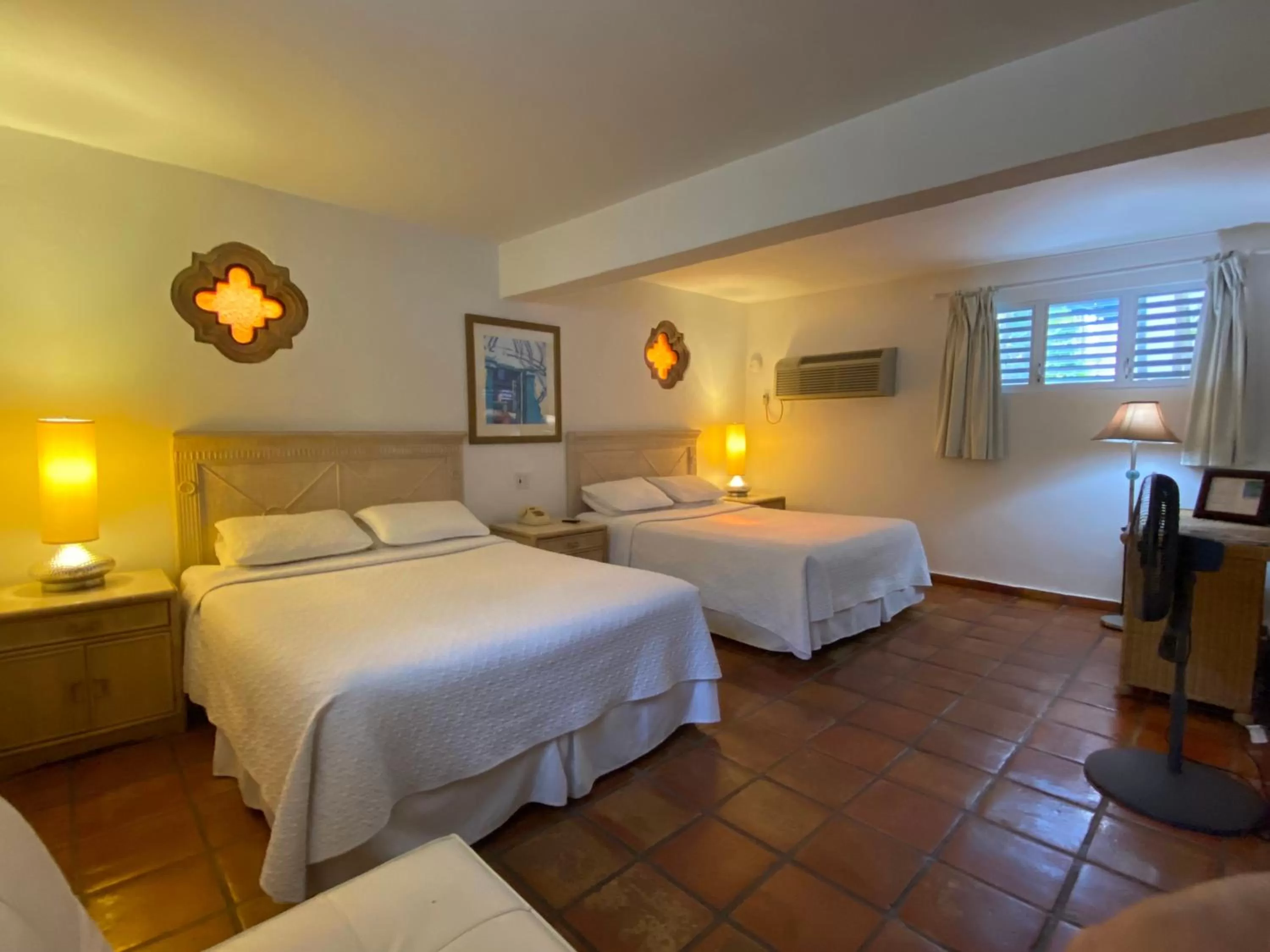 Bed in At Wind Chimes Boutique Hotel