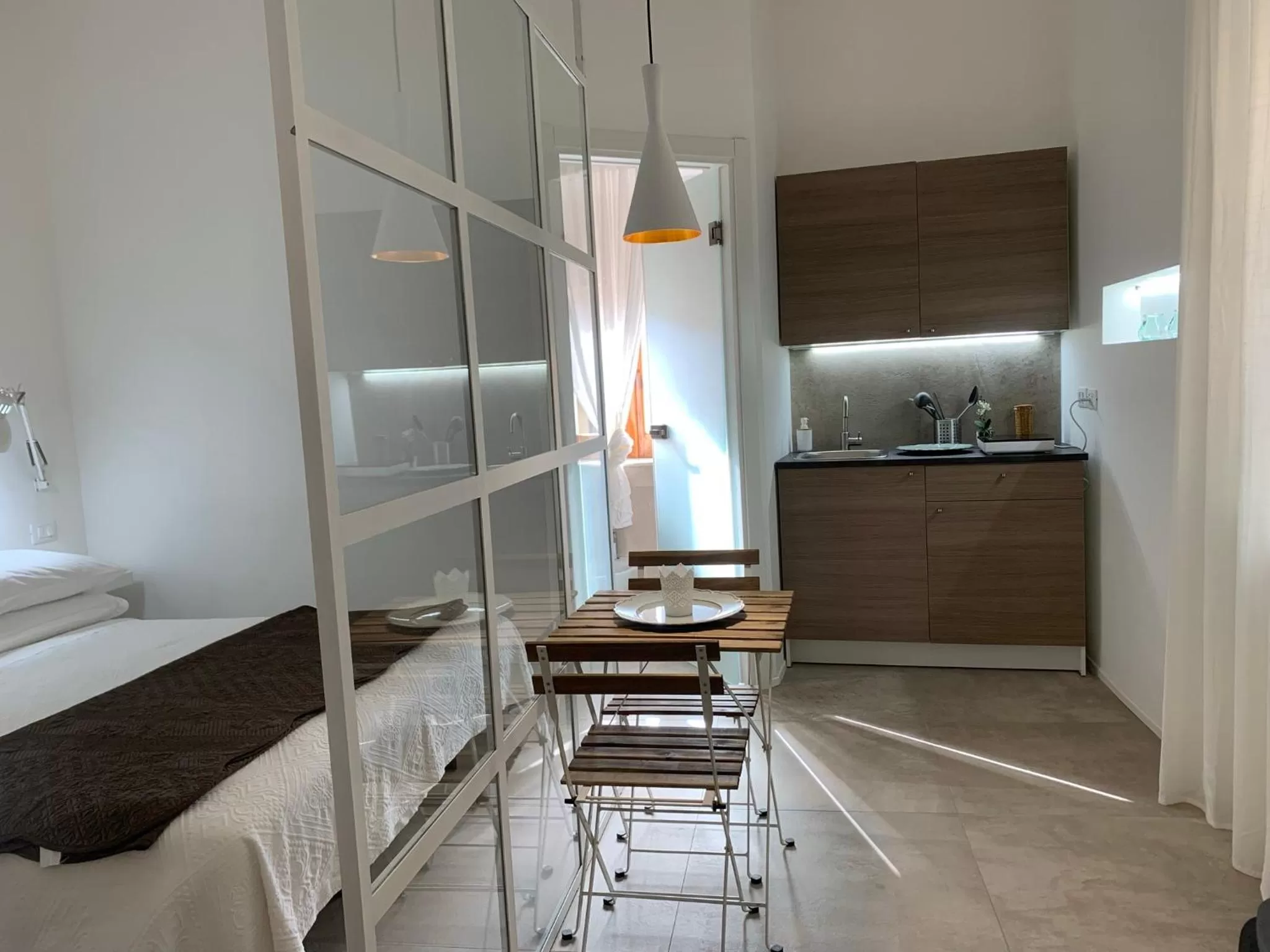 Kitchen or kitchenette, Bed in Il Giardino d'Ulisse