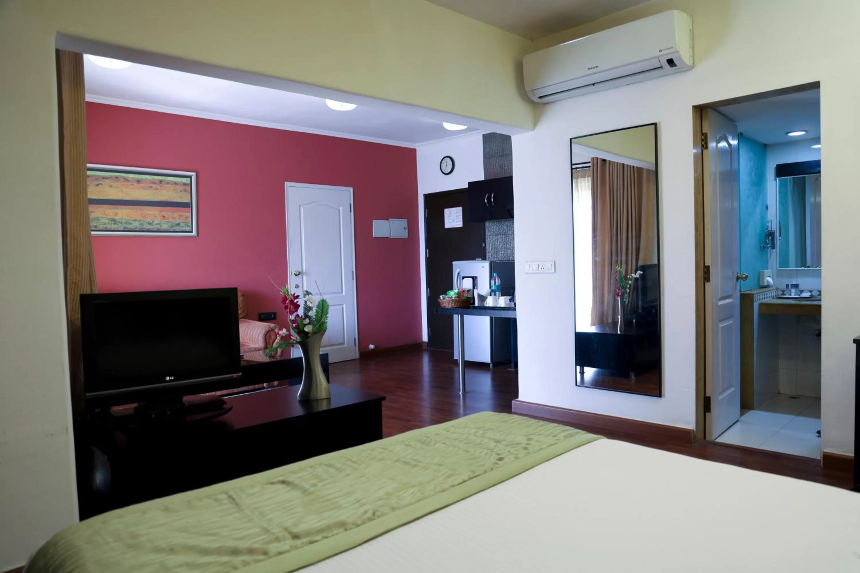 Bathroom, Bed in Royal Orchid Golden Suites Pune