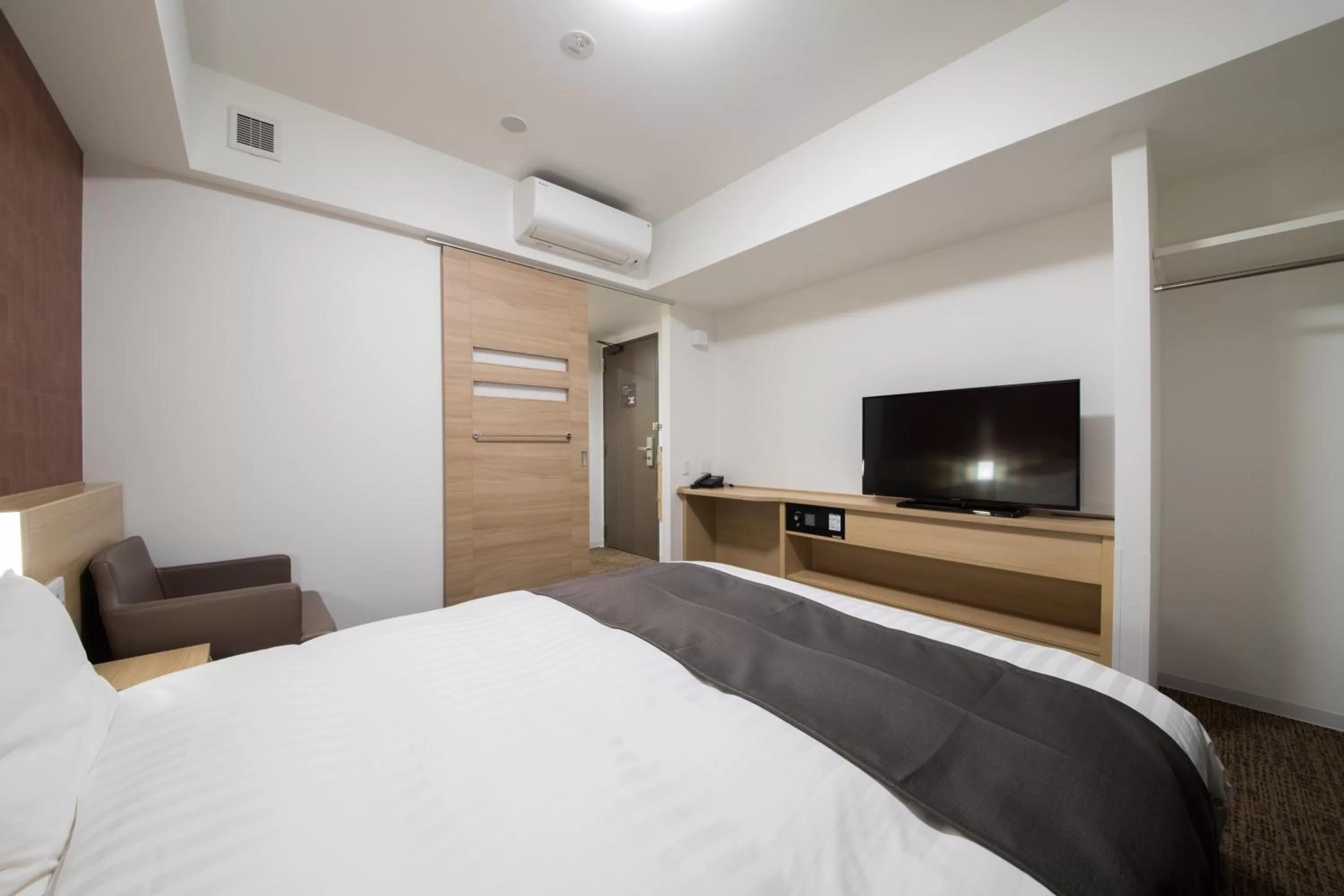 Photo of the whole room, Bed in Dormy Inn Matsuyama Natural Hot Spring