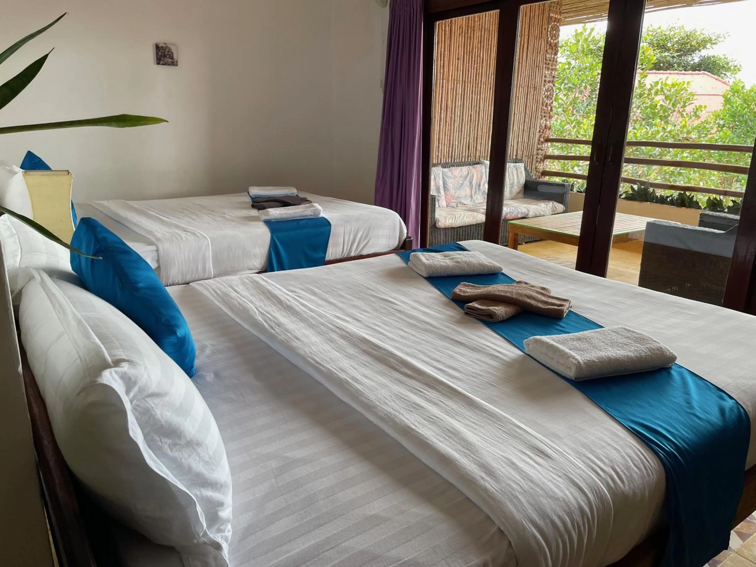 Quadruple Room with Balcony in Kep Lodge