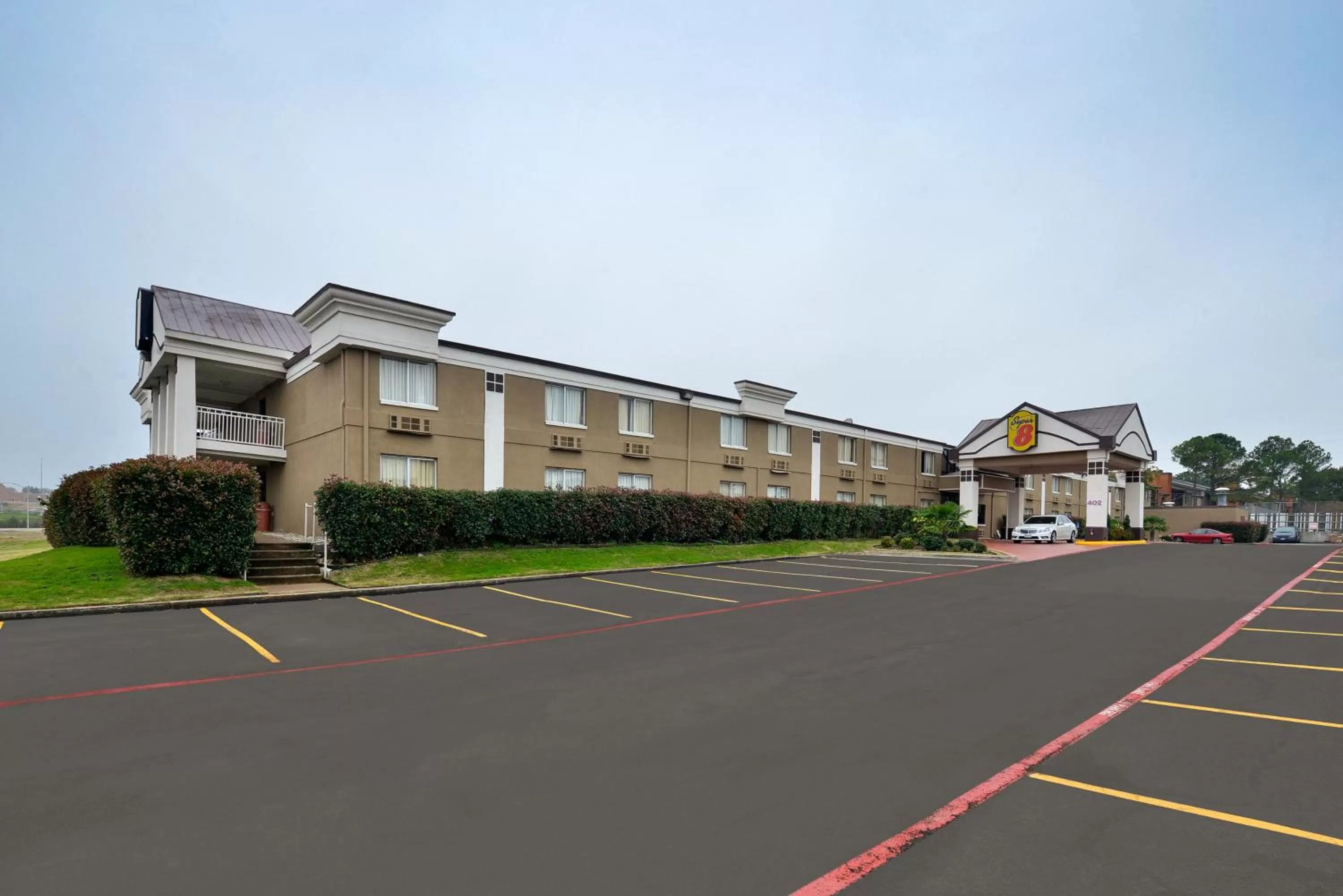 Property building in Super 8 by Wyndham Grand Prairie North