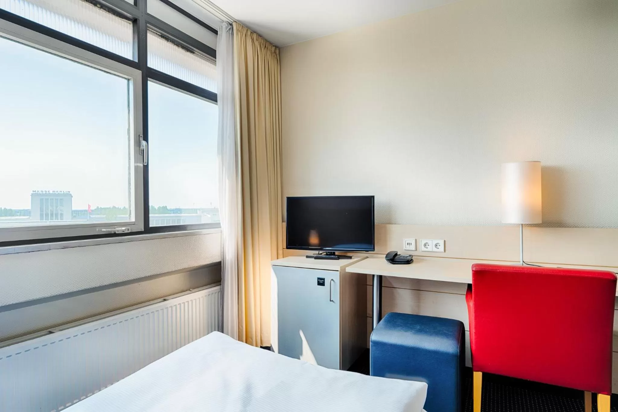 TV and multimedia, Bed in Enjoy Hotel am Studio