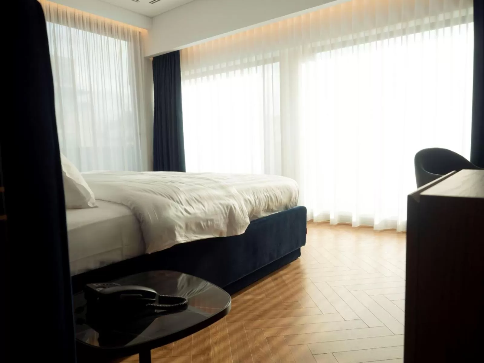 Bed in Moncafe BoutiqueHotel Spa