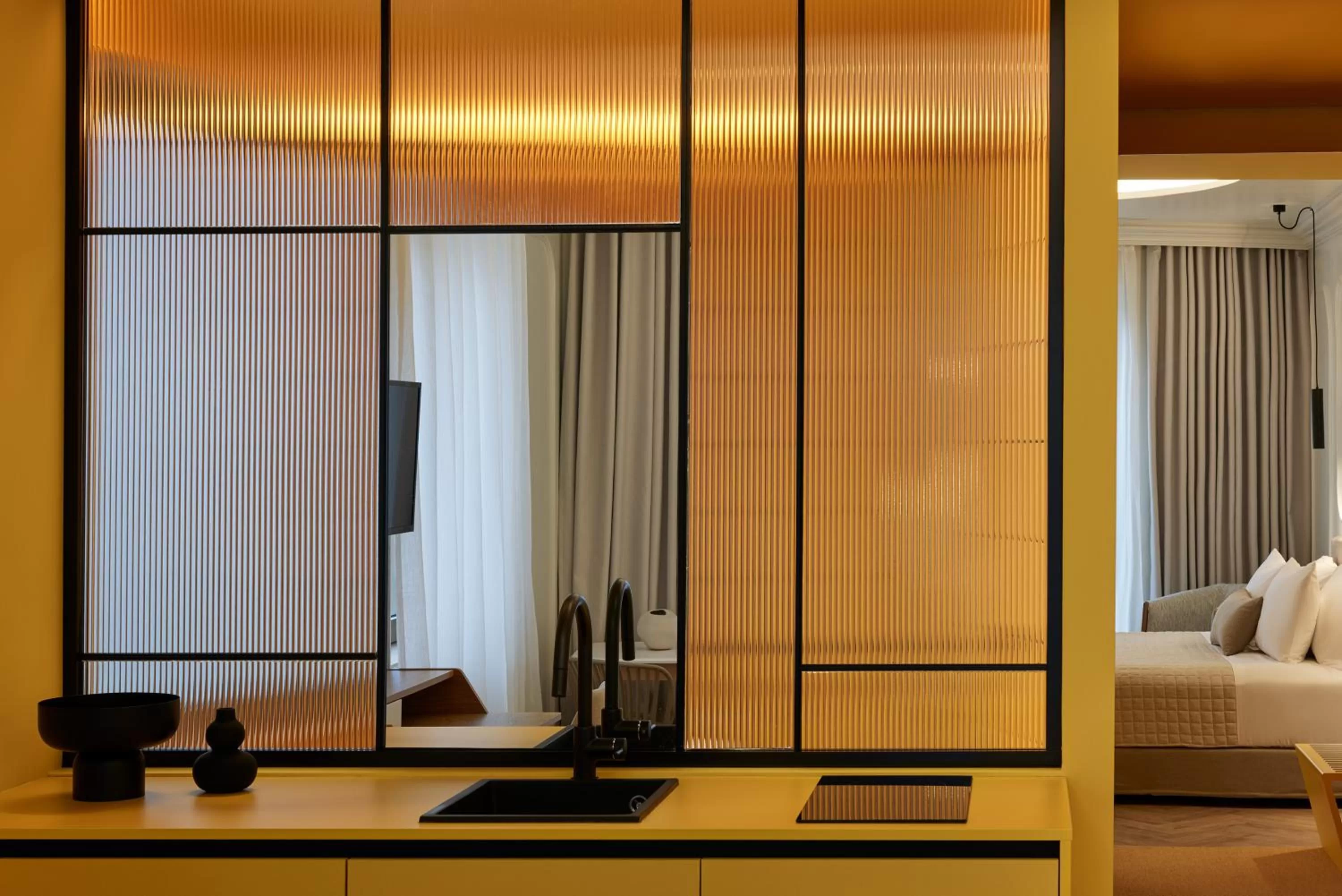 Bed in DWELL - Elegant City Stay