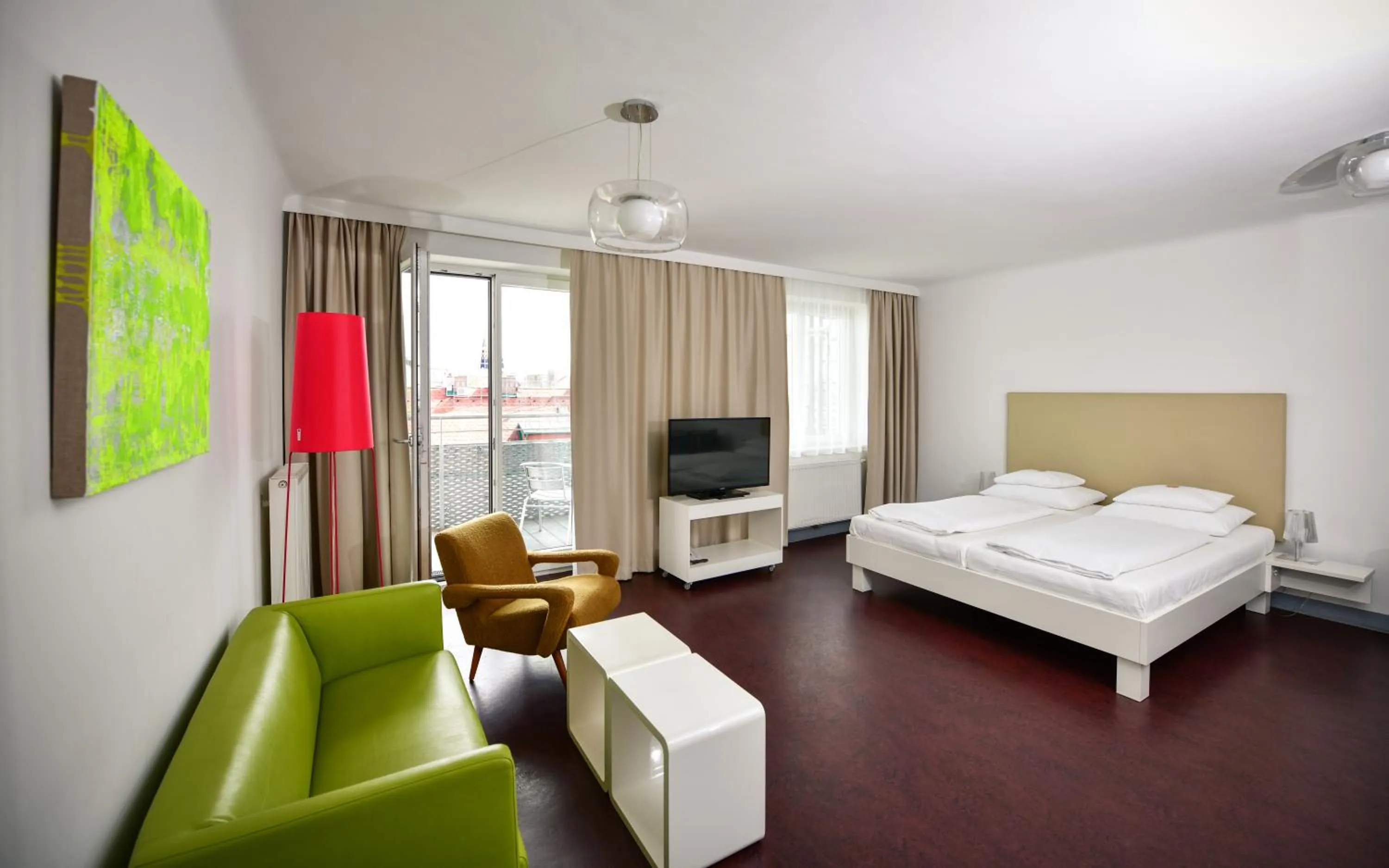 Living room, Bed in Stanys - Das Apartmenthotel