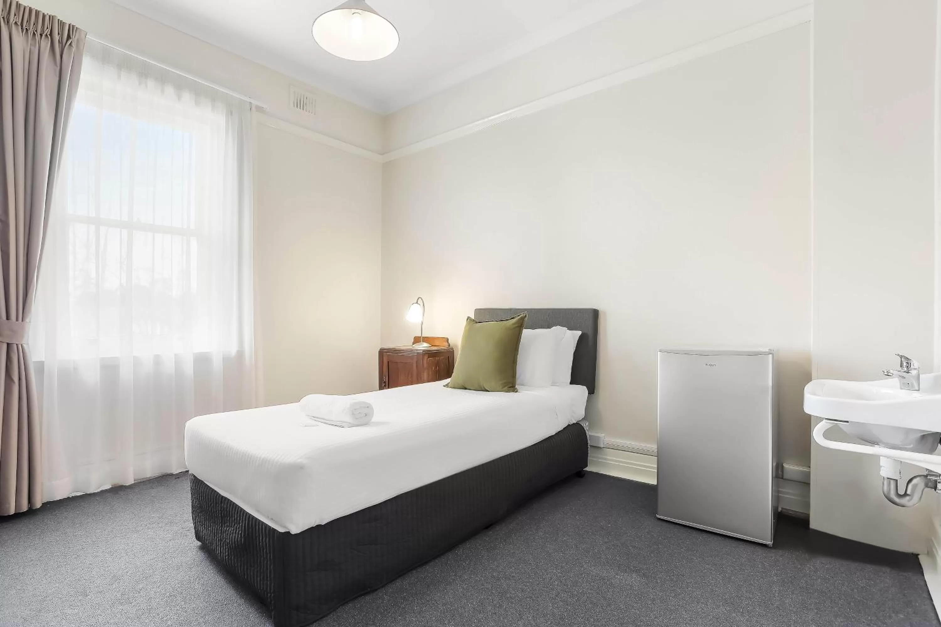 Bed in Grand View Hotel