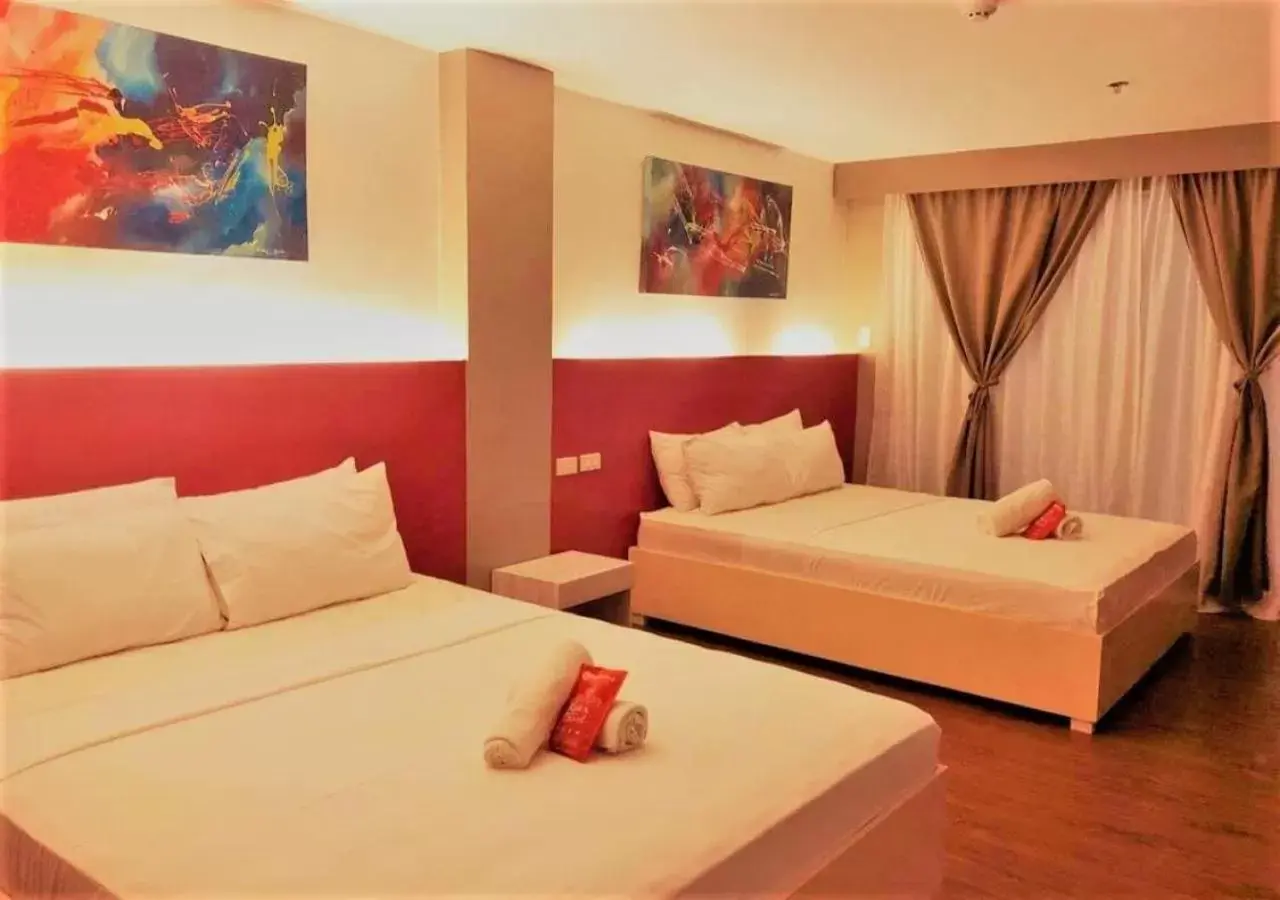 Family Room in RedDoorz Plus at Hotel Metro Kalibo Family Room in RedDoorz Plus at Hotel Metro Kalibo