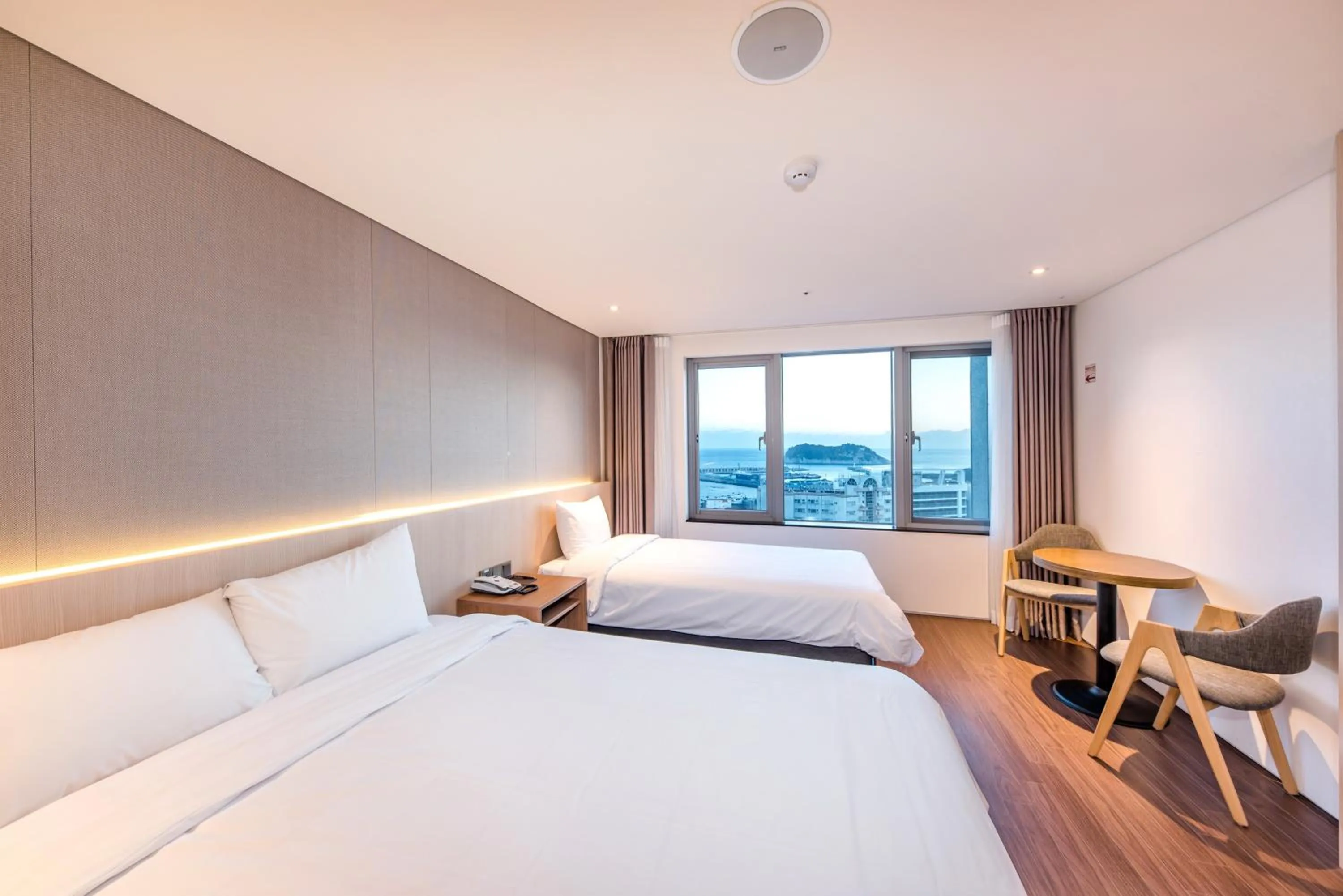 Photo of the whole room, Bed in The First70 Hotel