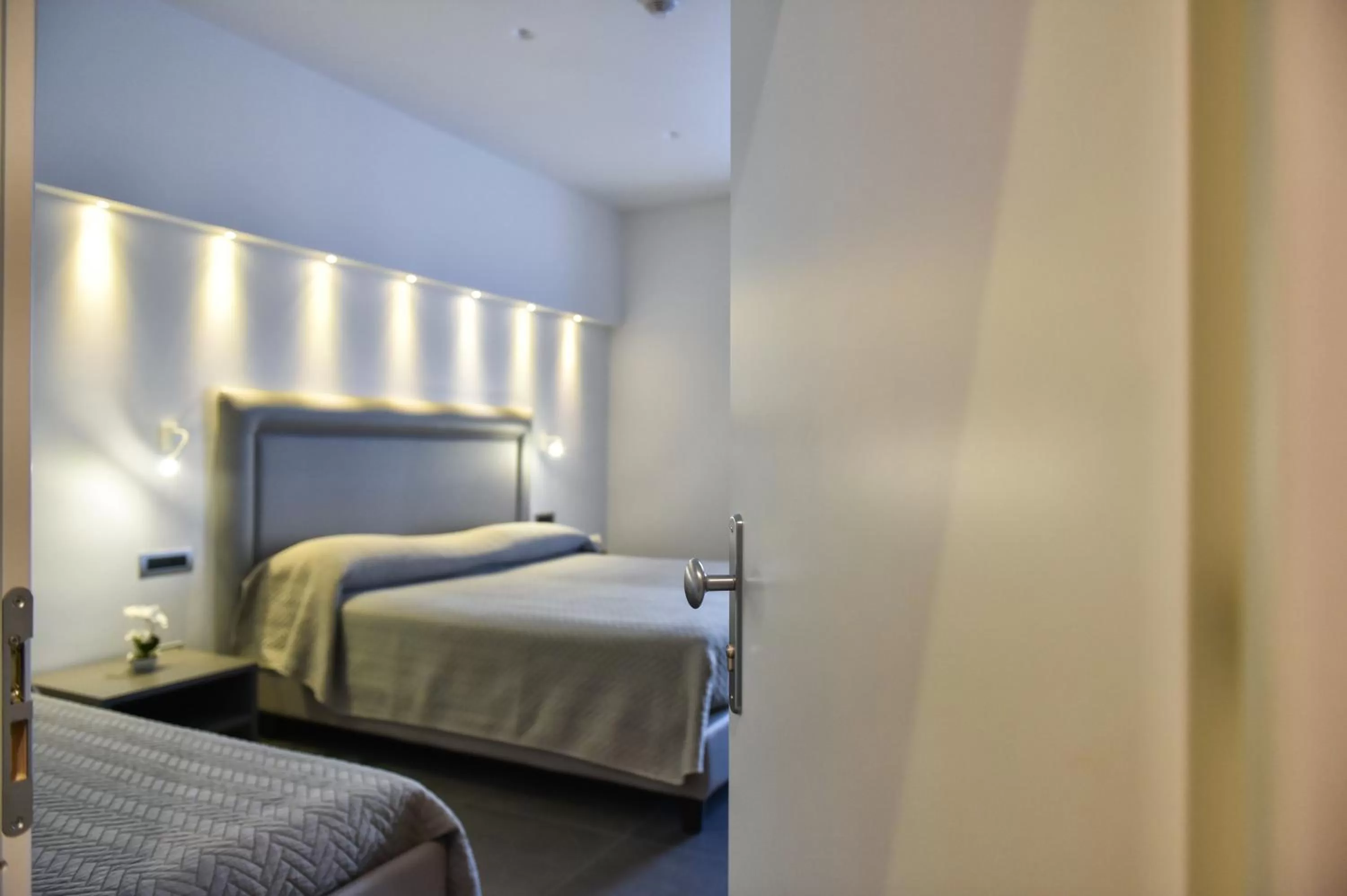 Bed in Pompei Inn Ruins B&B Luxury Suite