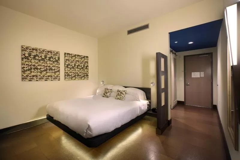 Bed in CityFlatsHotel - Grand Rapids, an Ascend Collection Hotel