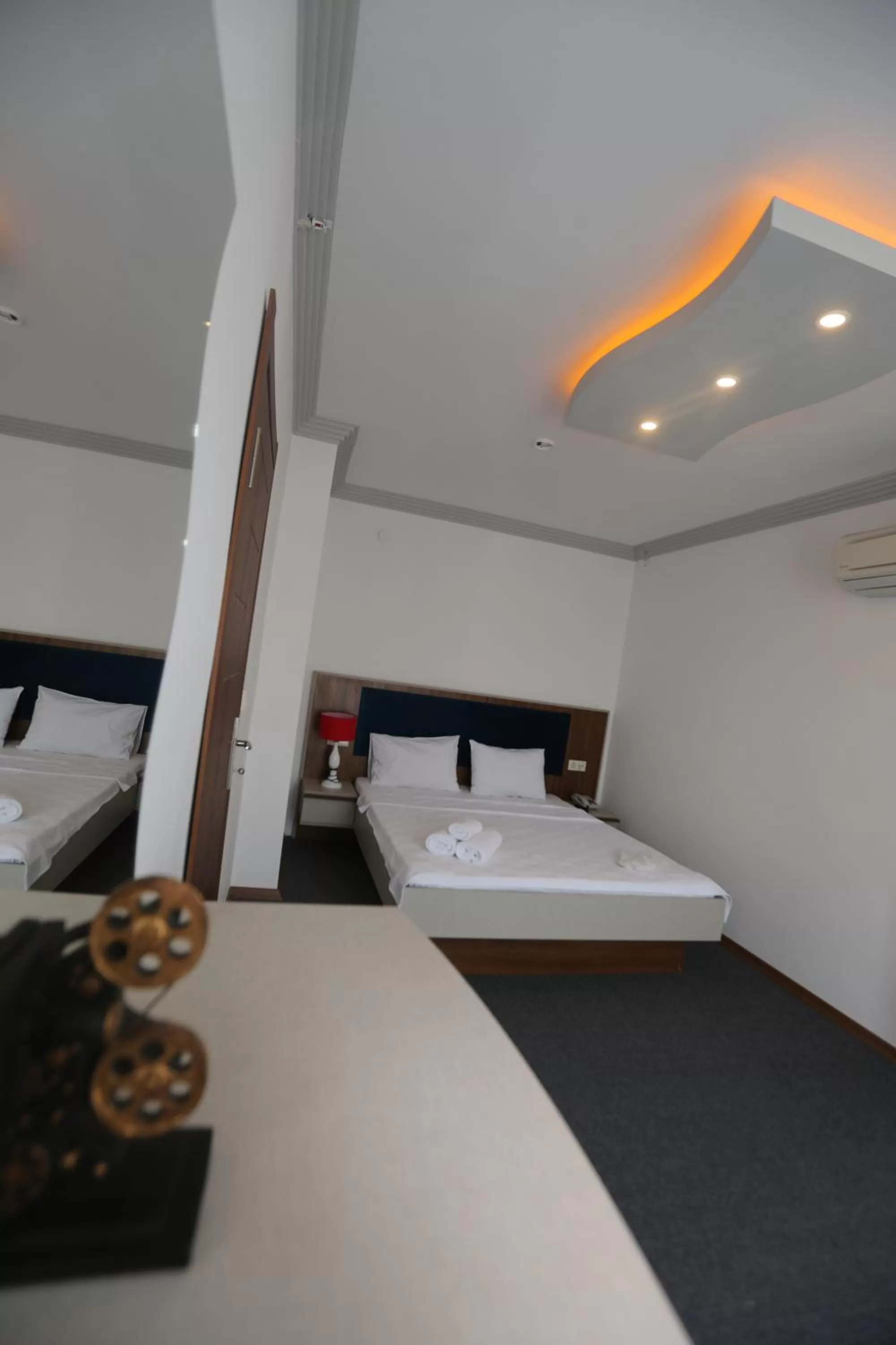 Bed in TEVETOGLU HOTEL