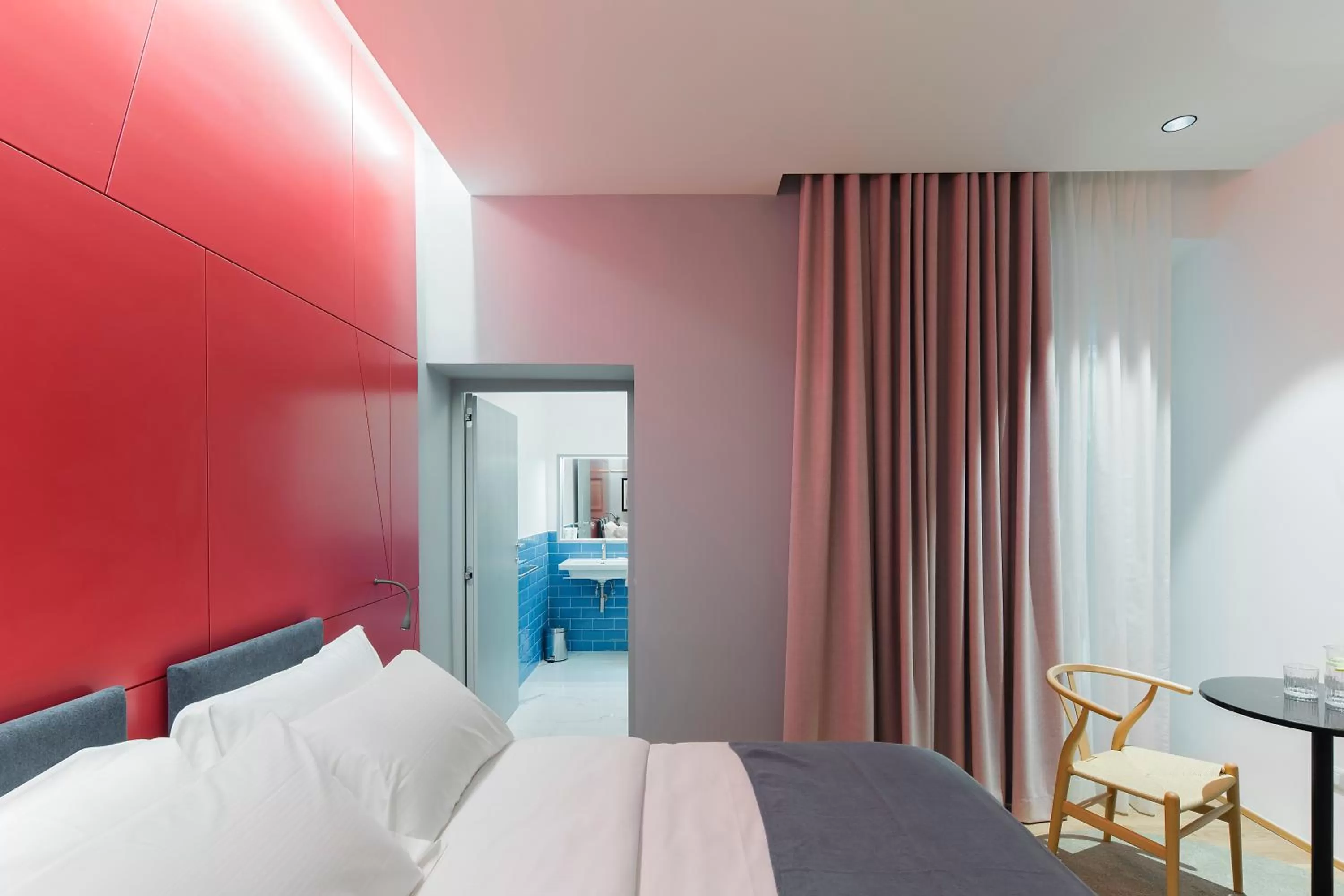 Bed in The Radical Hotel Roma