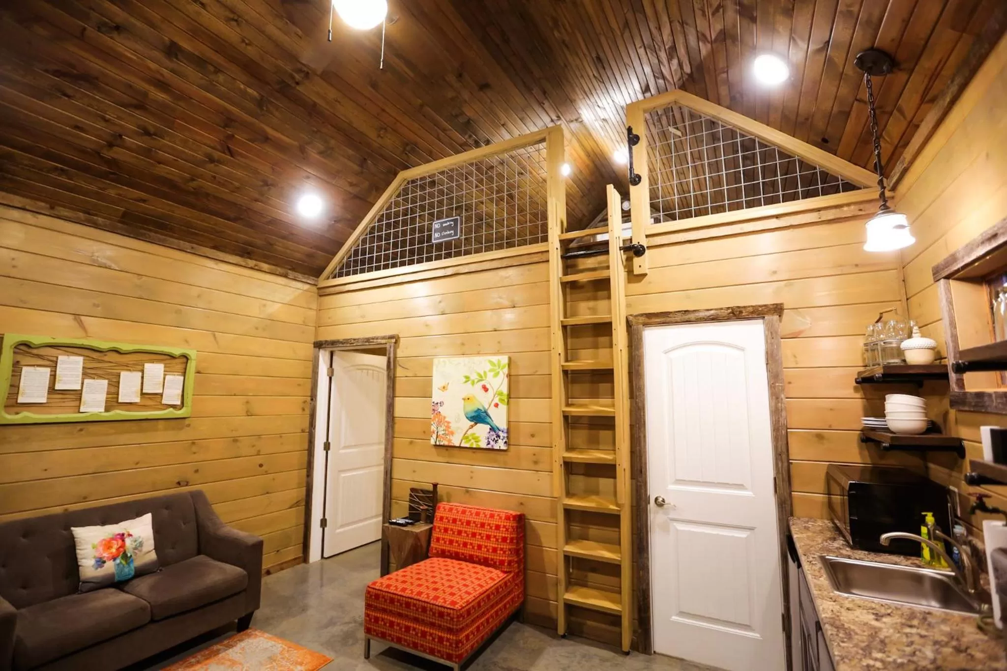 Seating area in Knotty Squirrel Cabins