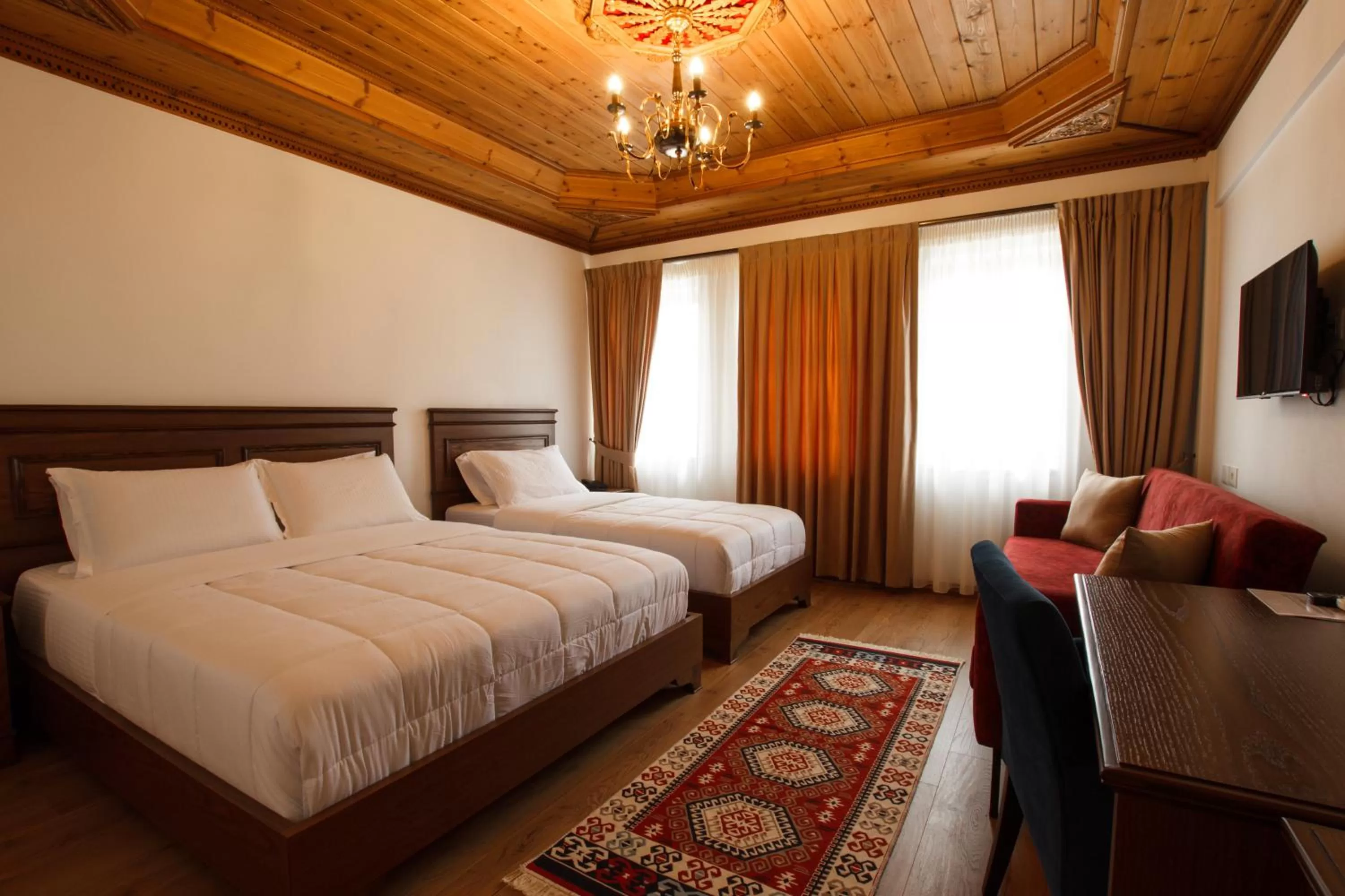 Bed in Rose Garden Hotel