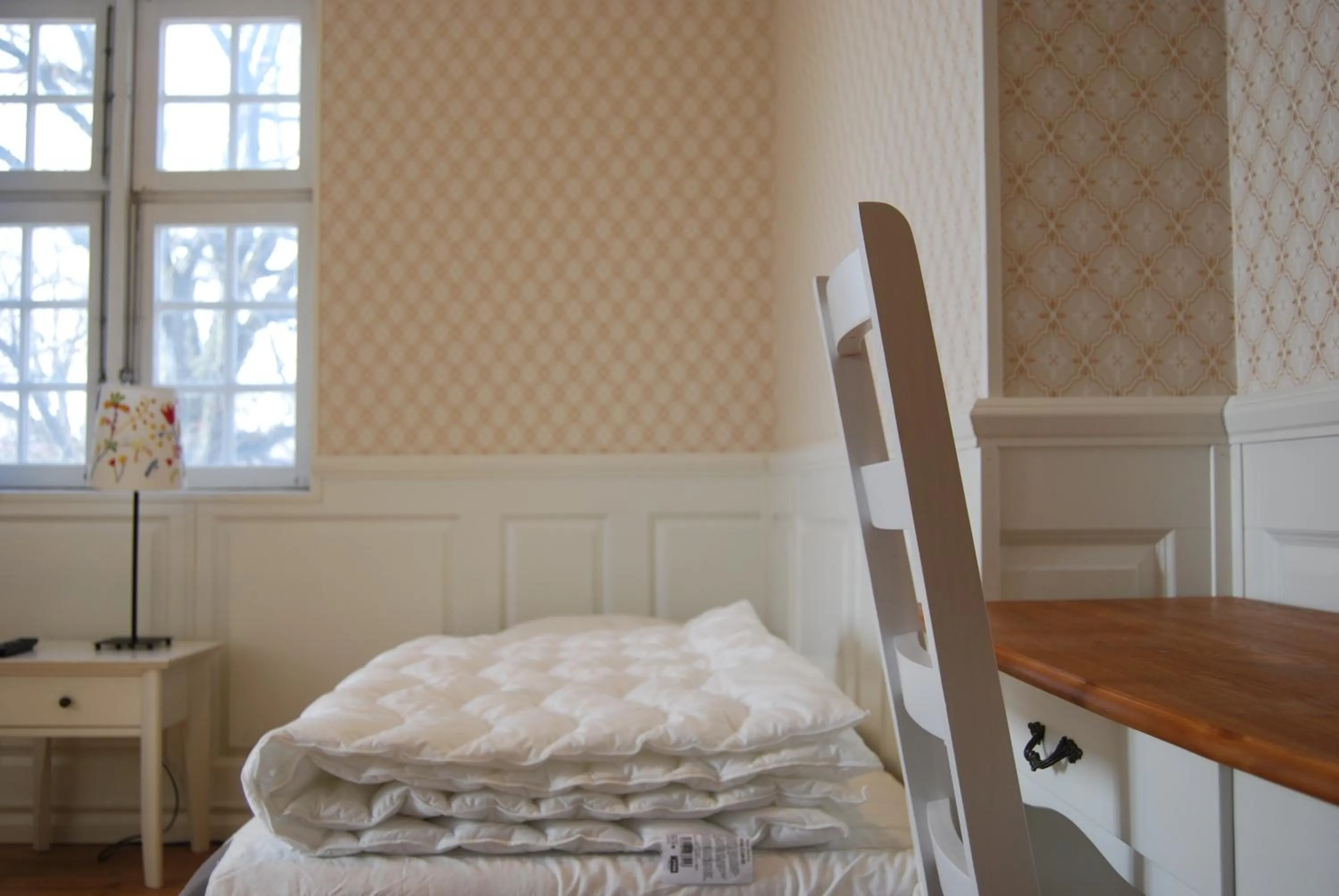 Bed in Halmstad Hotell & Vandrarhem Kaptenshamn