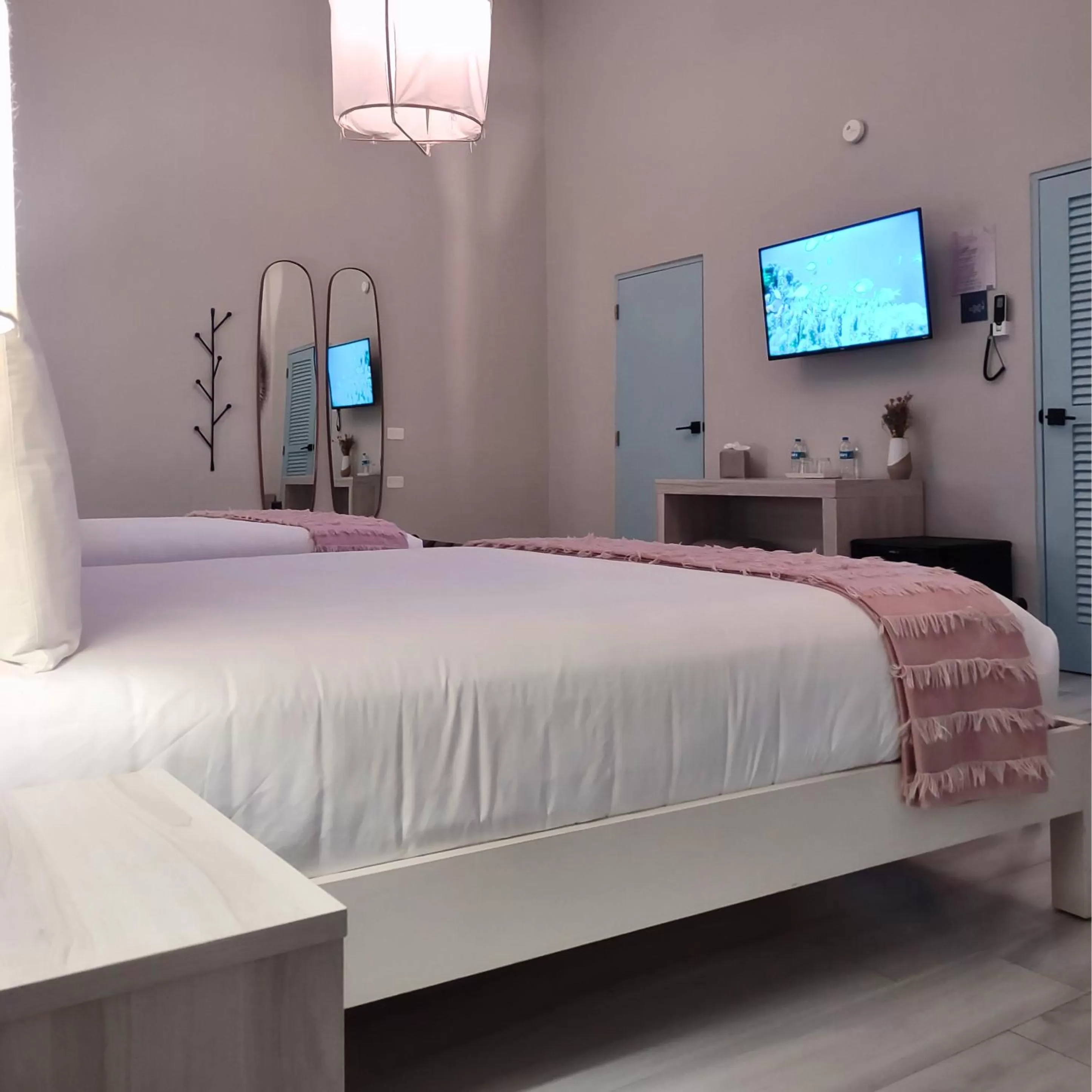 Bed in Trópica Beach Hotel