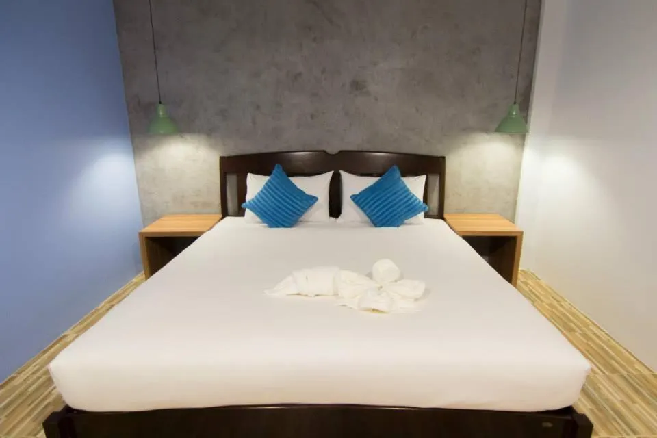 Bed in K.L. Boutique Hotel