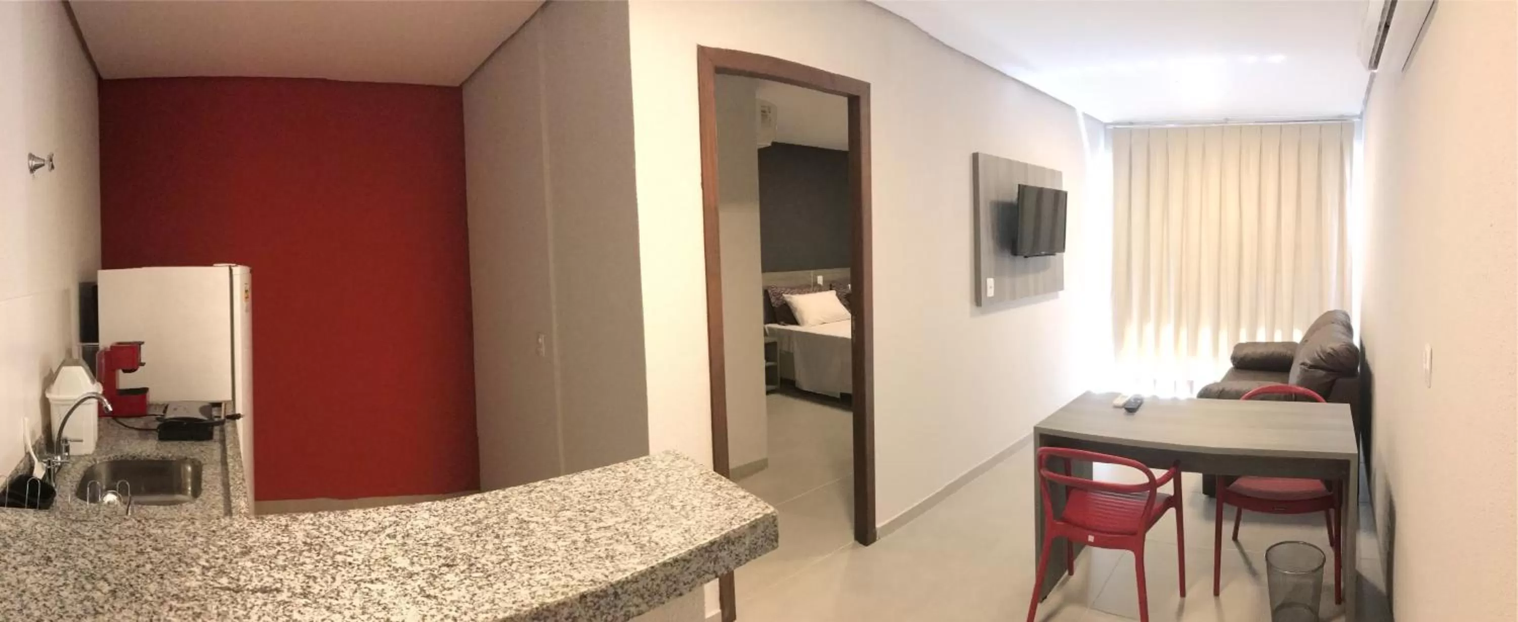 Communal lounge/ TV room in 103 Hotel & Flats