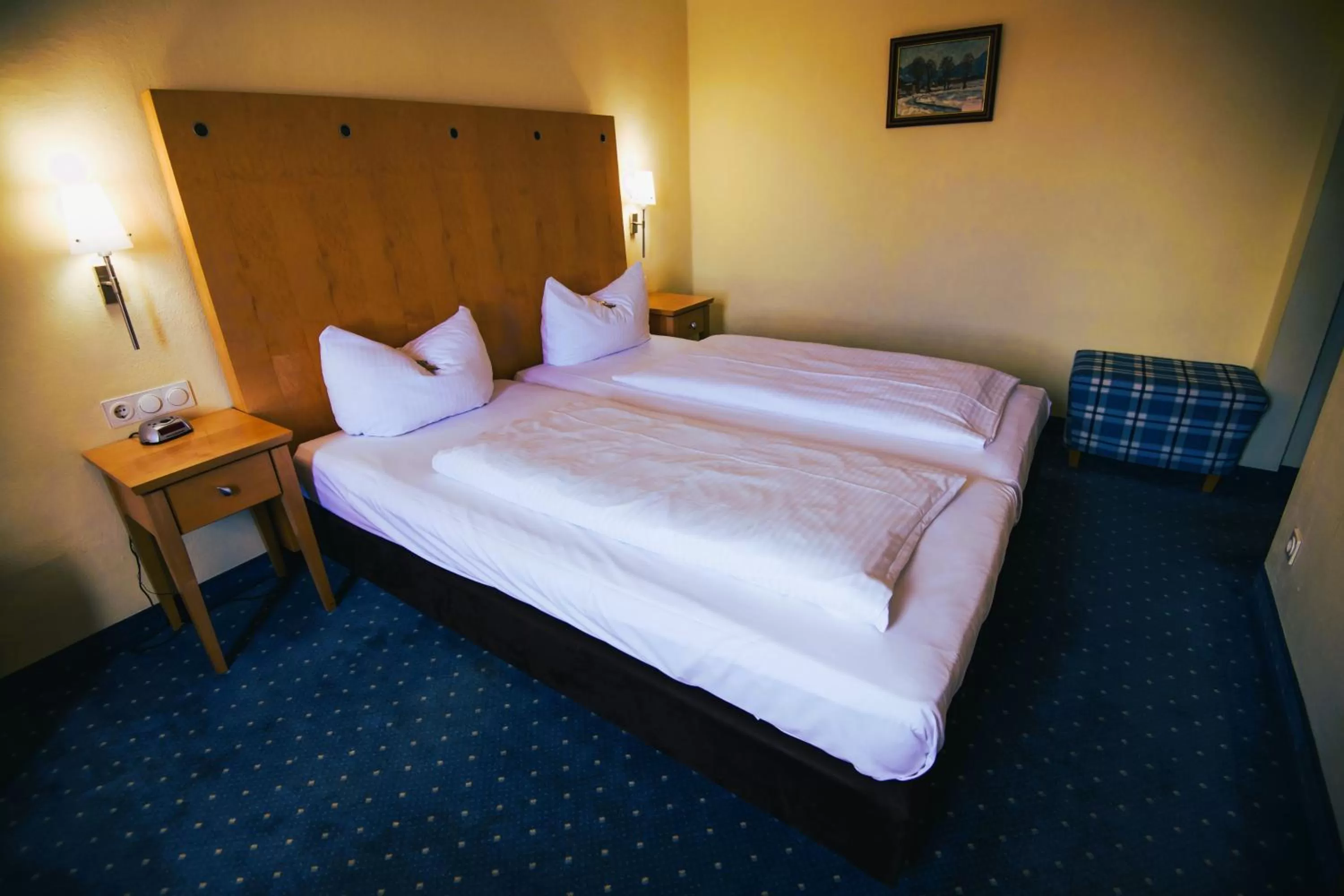 Bed in Hotel Rosenheimer Hof