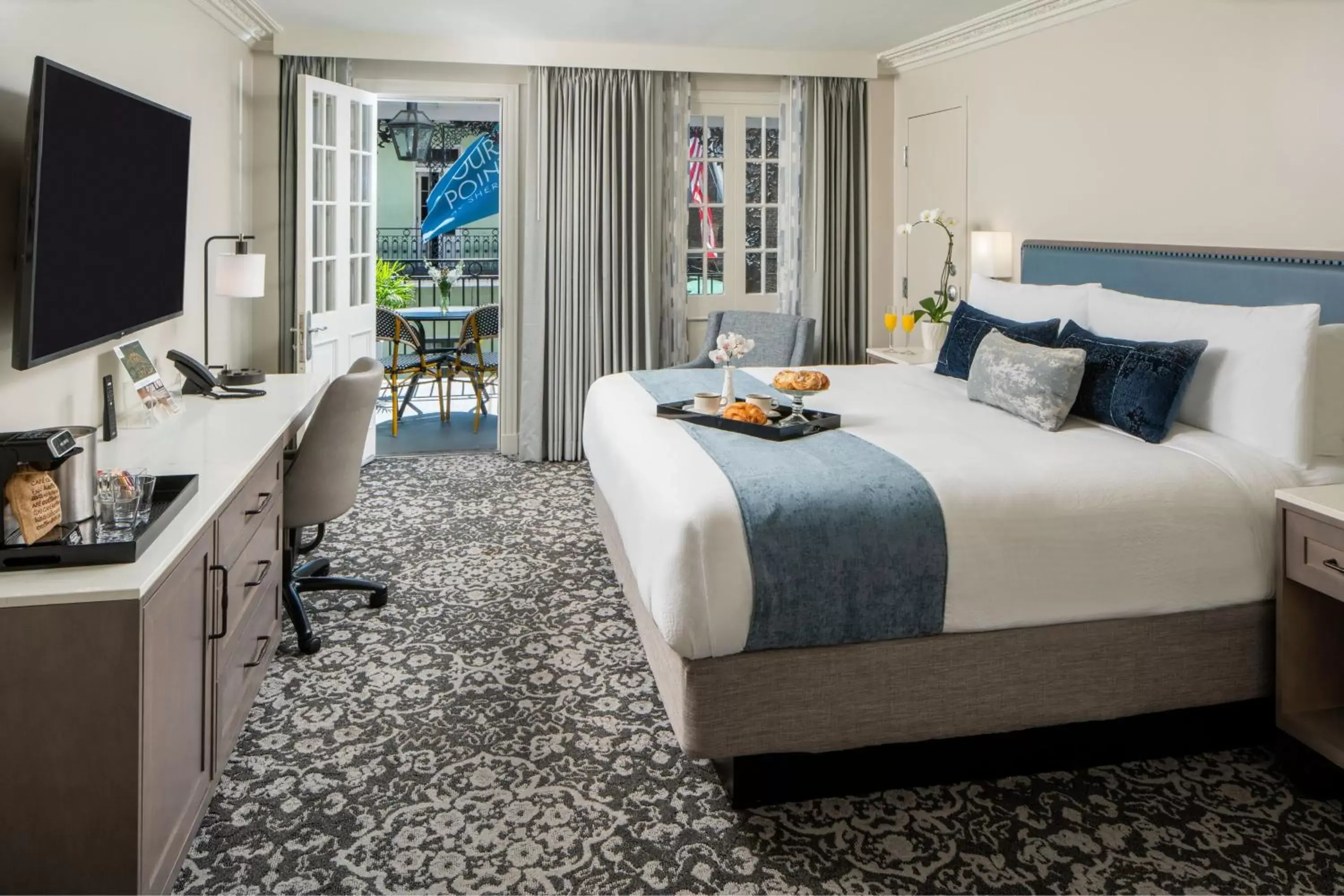 Premium Guest Room, Balcony, 1 King Bed, Bourbon Street View in Four Points by Sheraton French Quarter Premium Guest Room, Balcony, 1 King Bed, Bourbon Street View in Four Points by Sheraton French Quarter