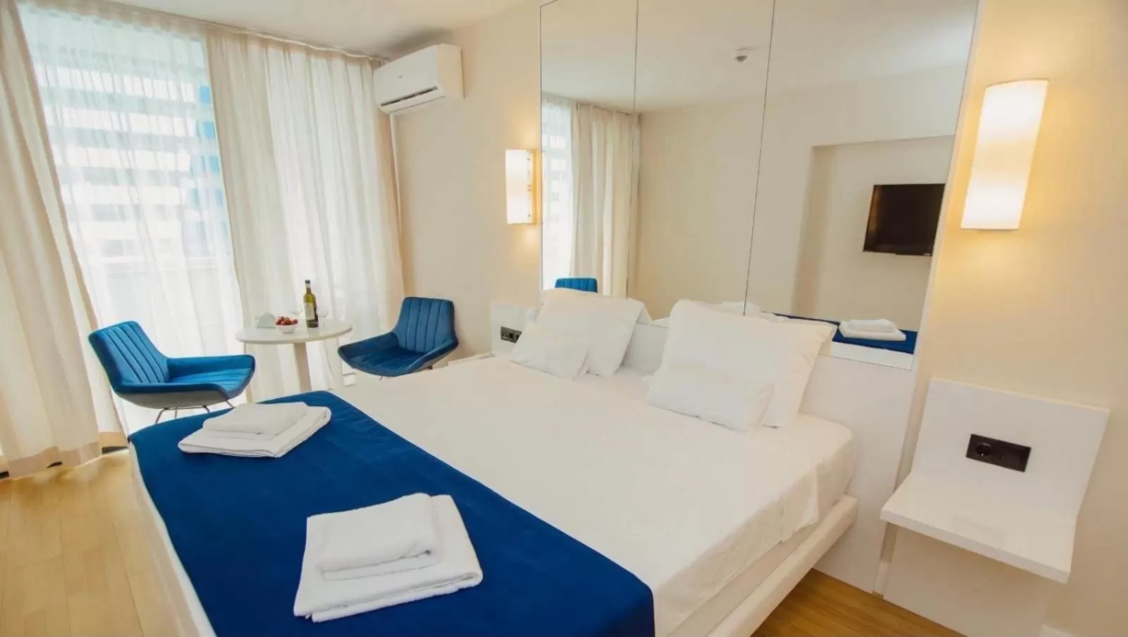 Seating area, Bed in Batumi Orbi City Wonderful Sea View