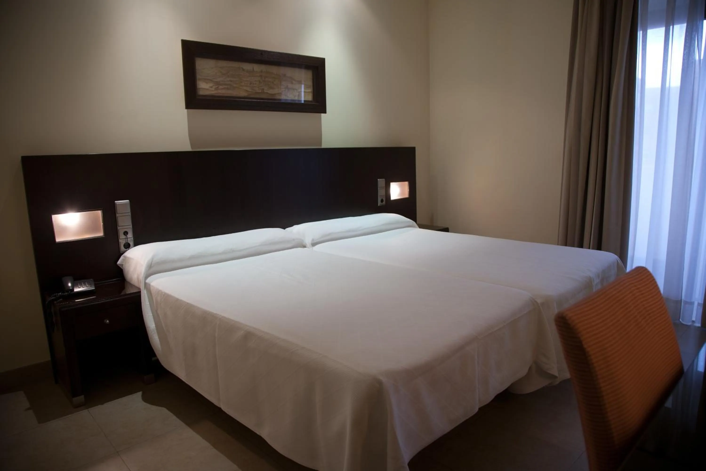 Bed in Hotel El Mesón