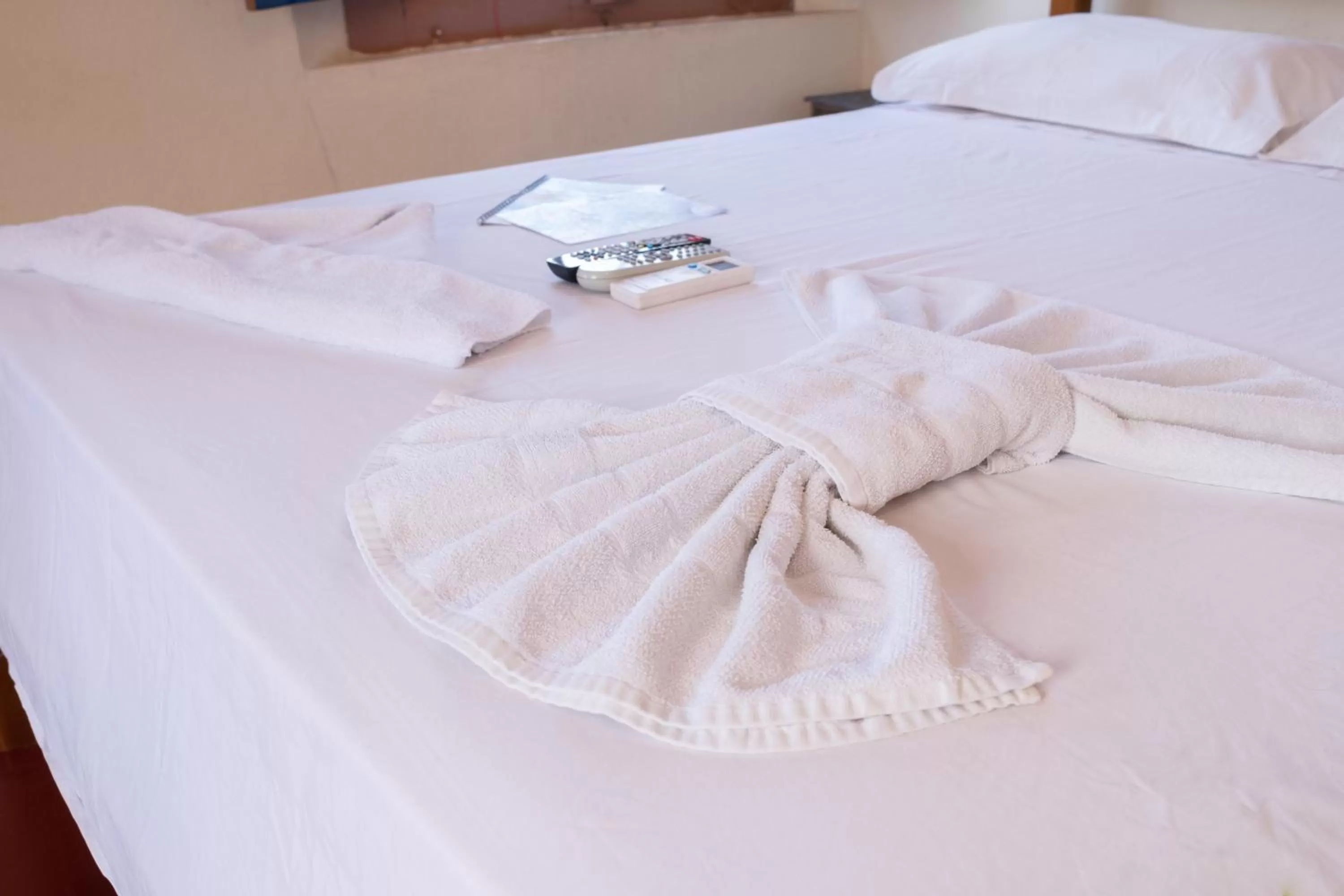 Bed in Hotel Lazaro Ubatuba Ltda