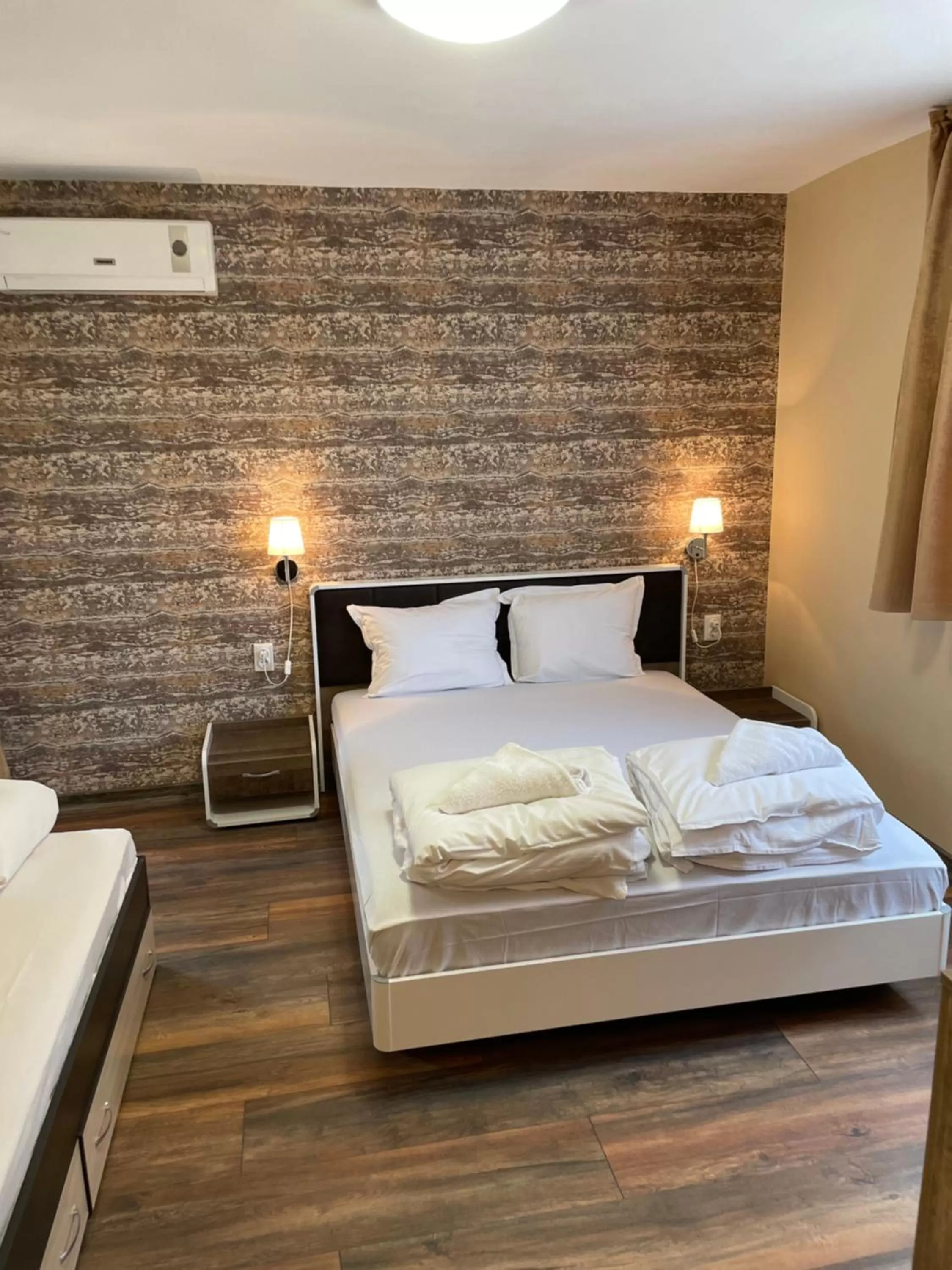 Bed in Family Hotel Malibu