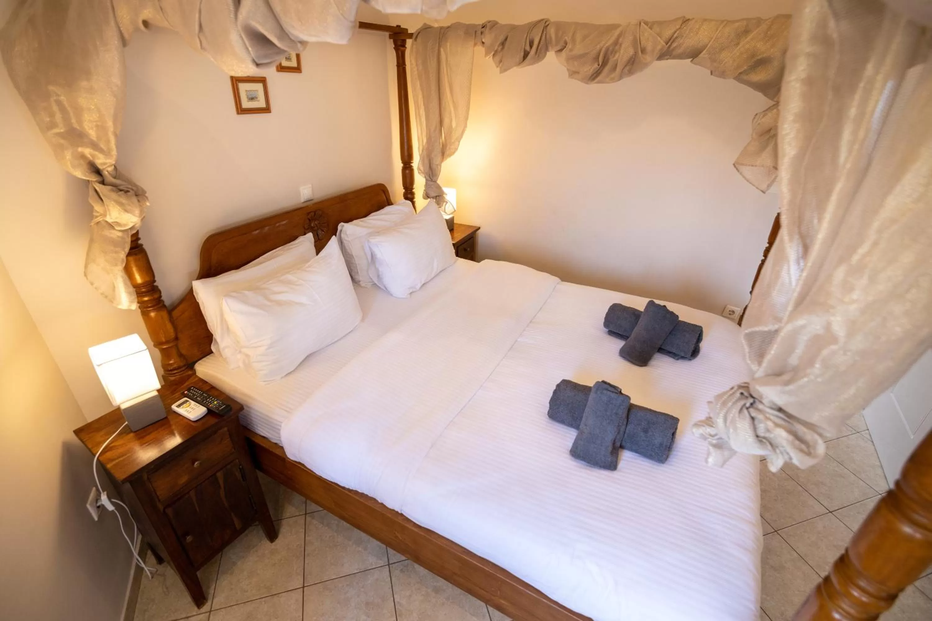 Bed in Votsalakia Hotel & Luxury Apartments