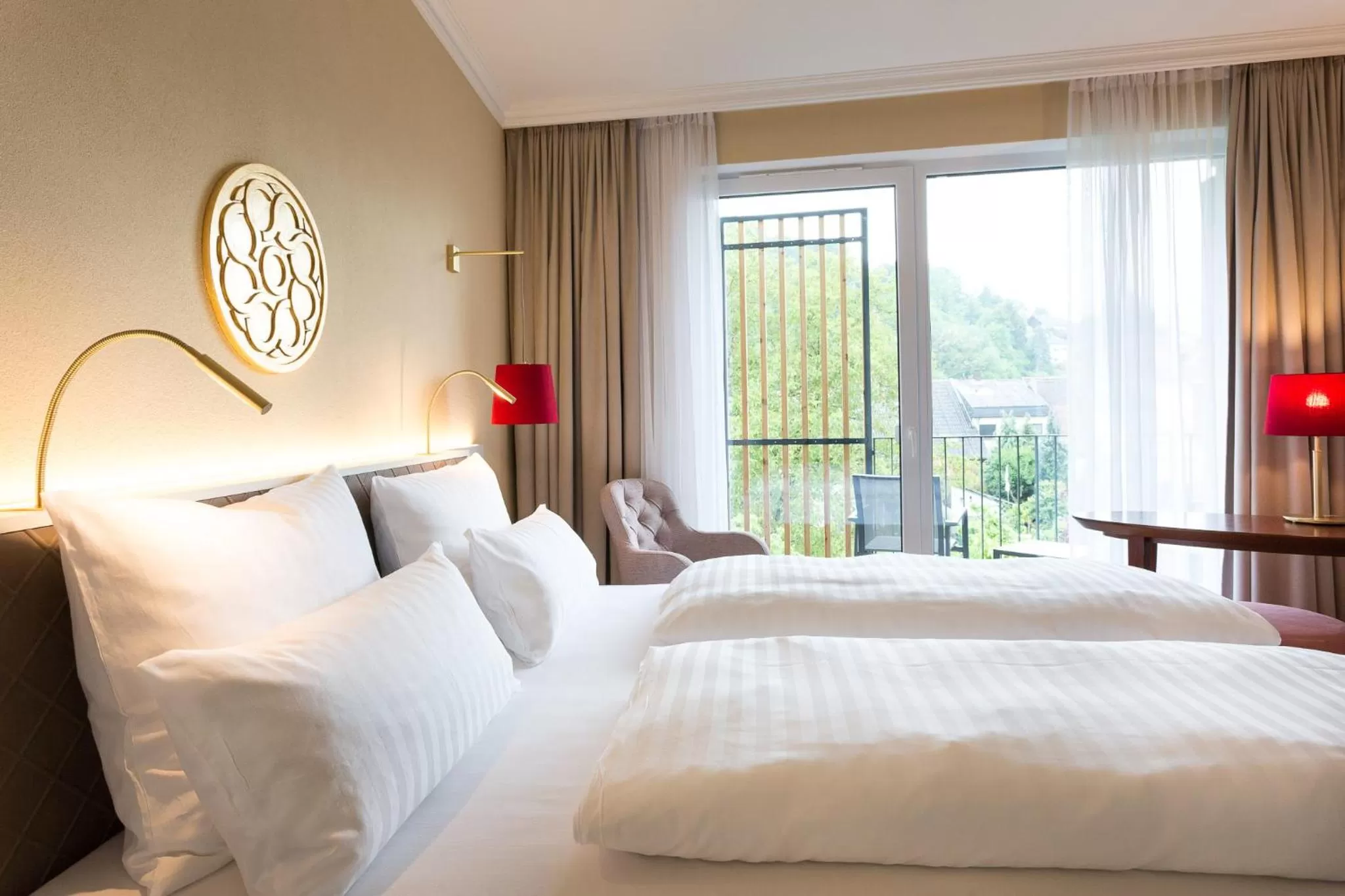 Bed in EMICH´S Hotel