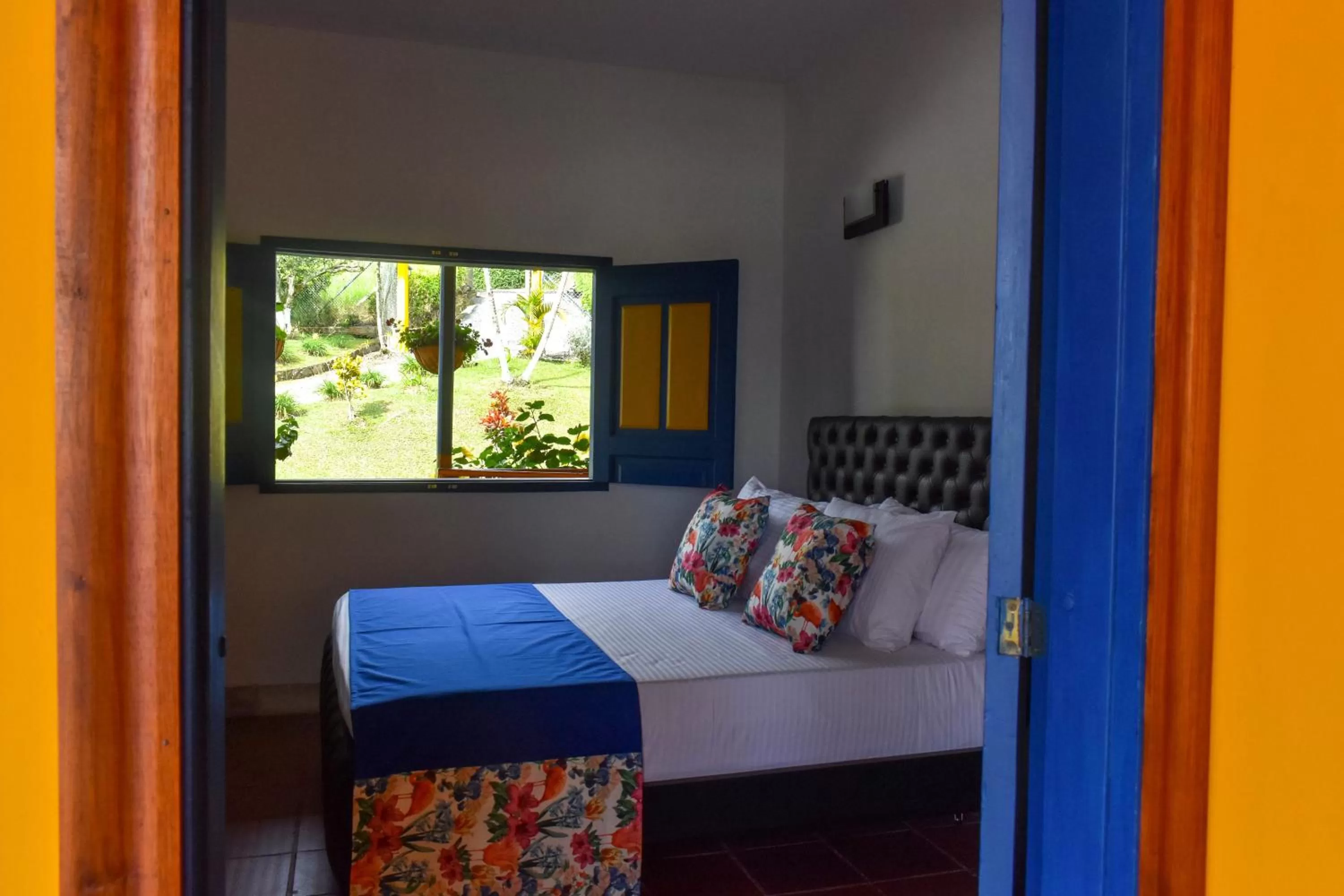 Bed in Guaduales Ecohotel