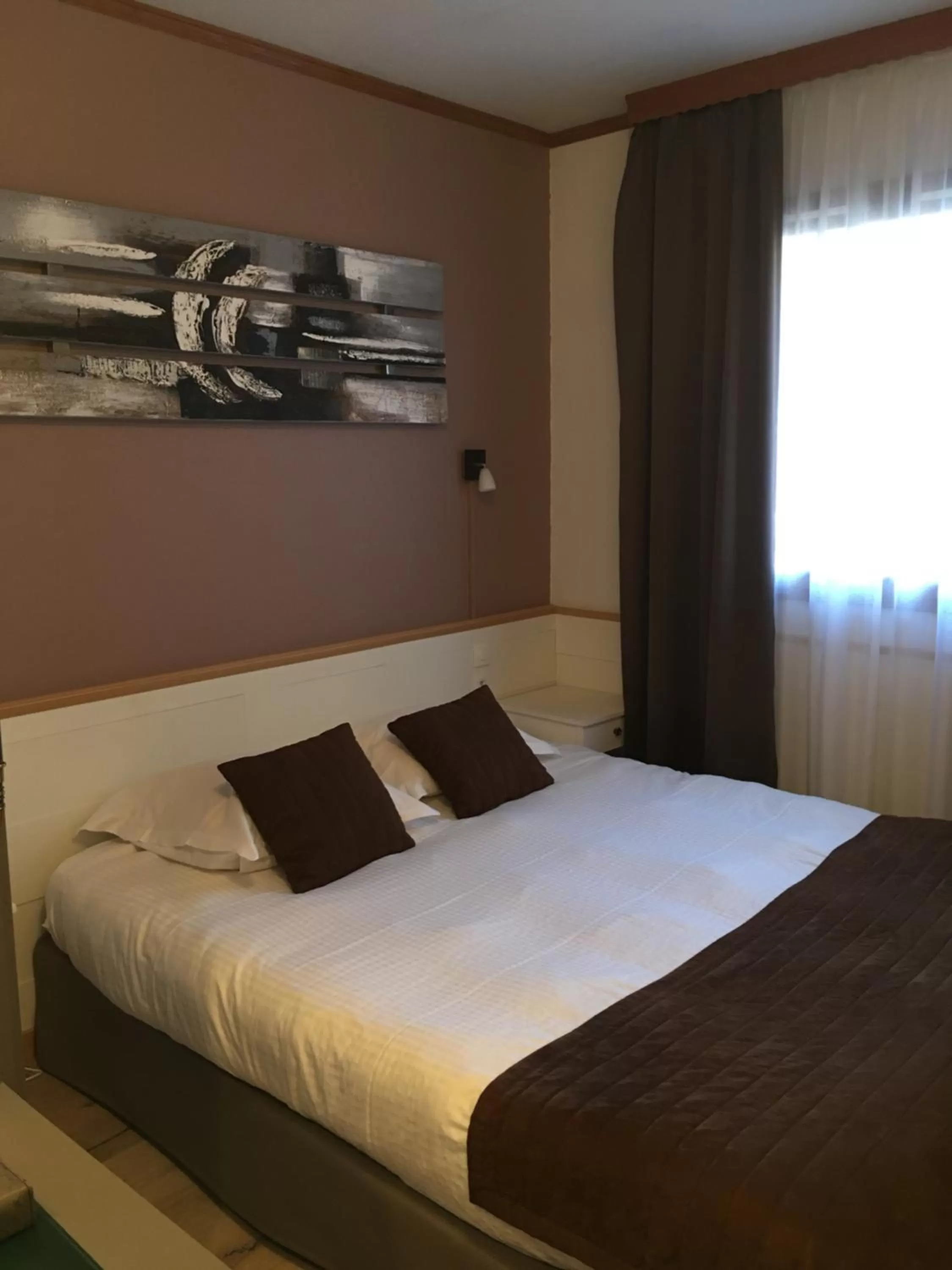 Photo of the whole room, Bed in Hôtel Le Rapp