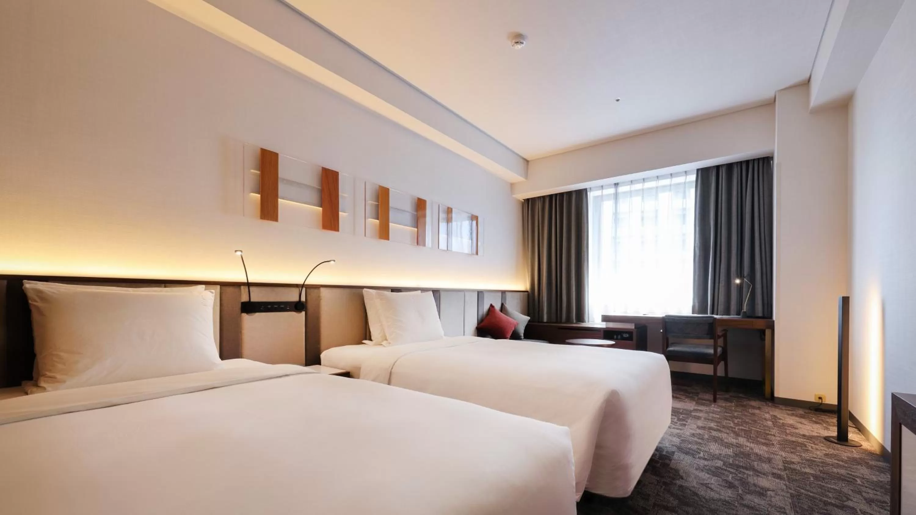 Bed in ANA Holiday Inn Sendai by IHG
