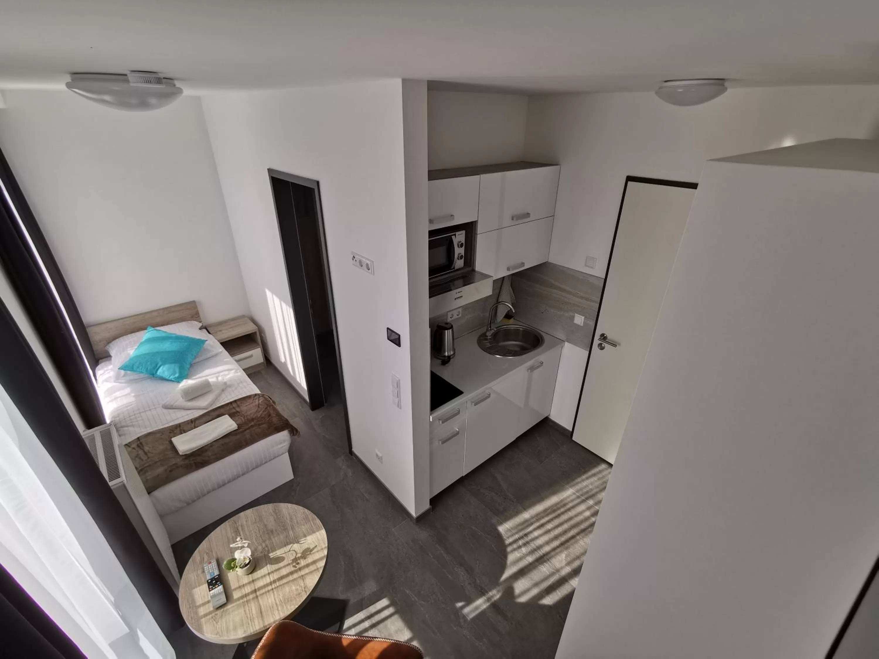 Kitchen or kitchenette in HP Apartments