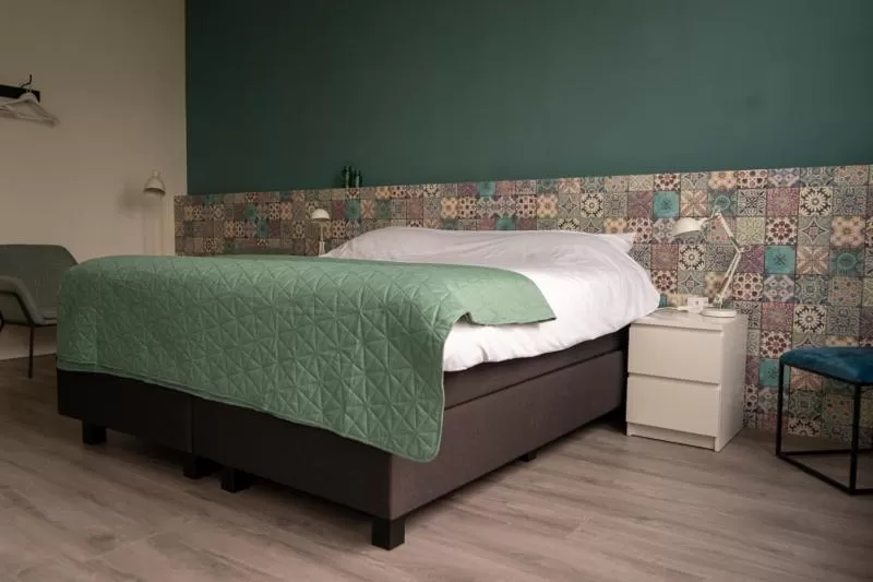 Bed in B&B de Wilhelminaschool