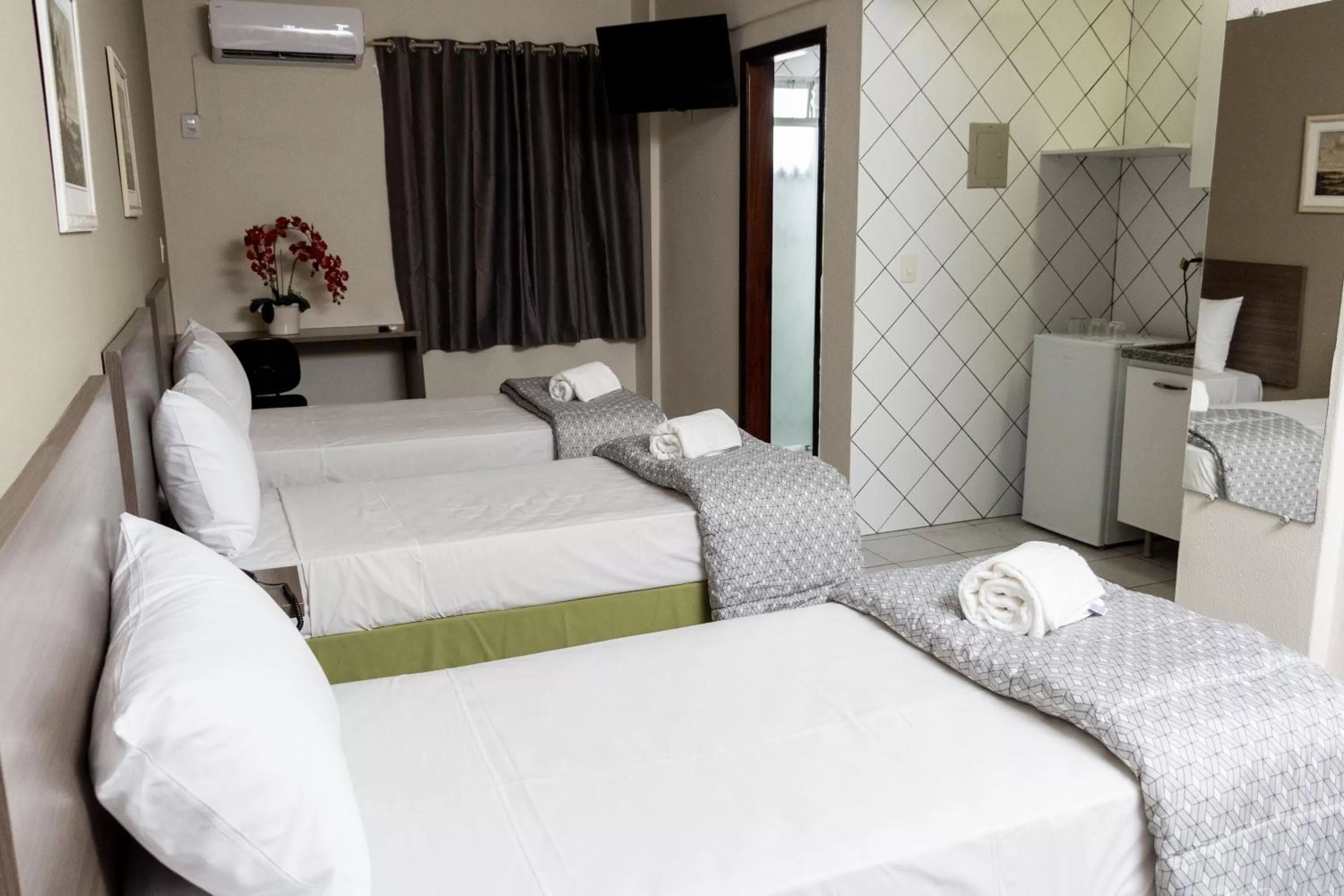 Photo of the whole room, Bed in Astor Hotel