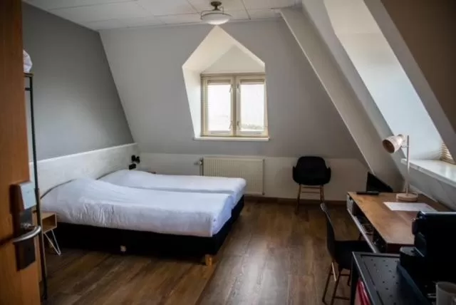 Twin Room with Lake View in Restaurant & Hotel Monopole Harderwijk