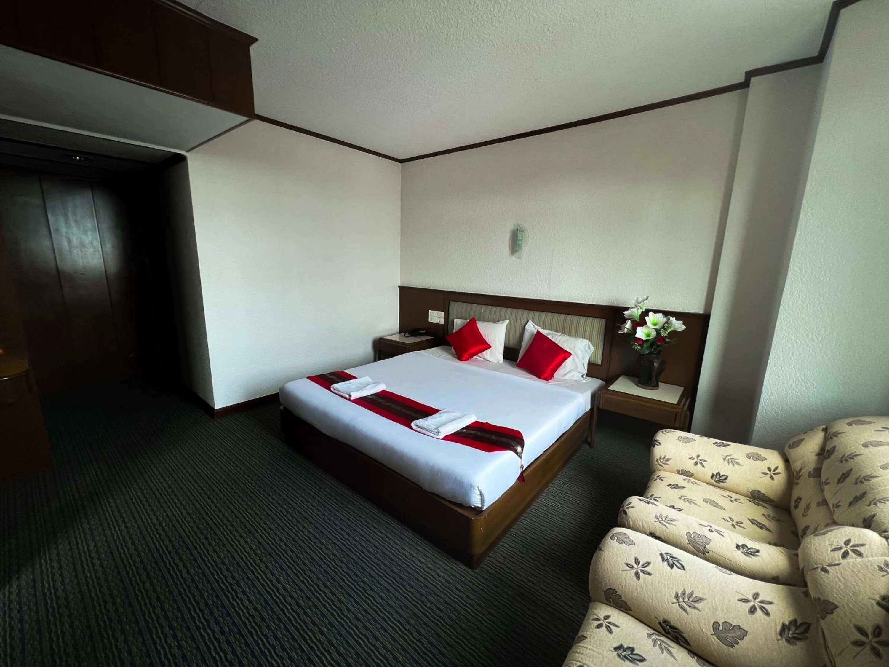 Bed in River Grand Hotel