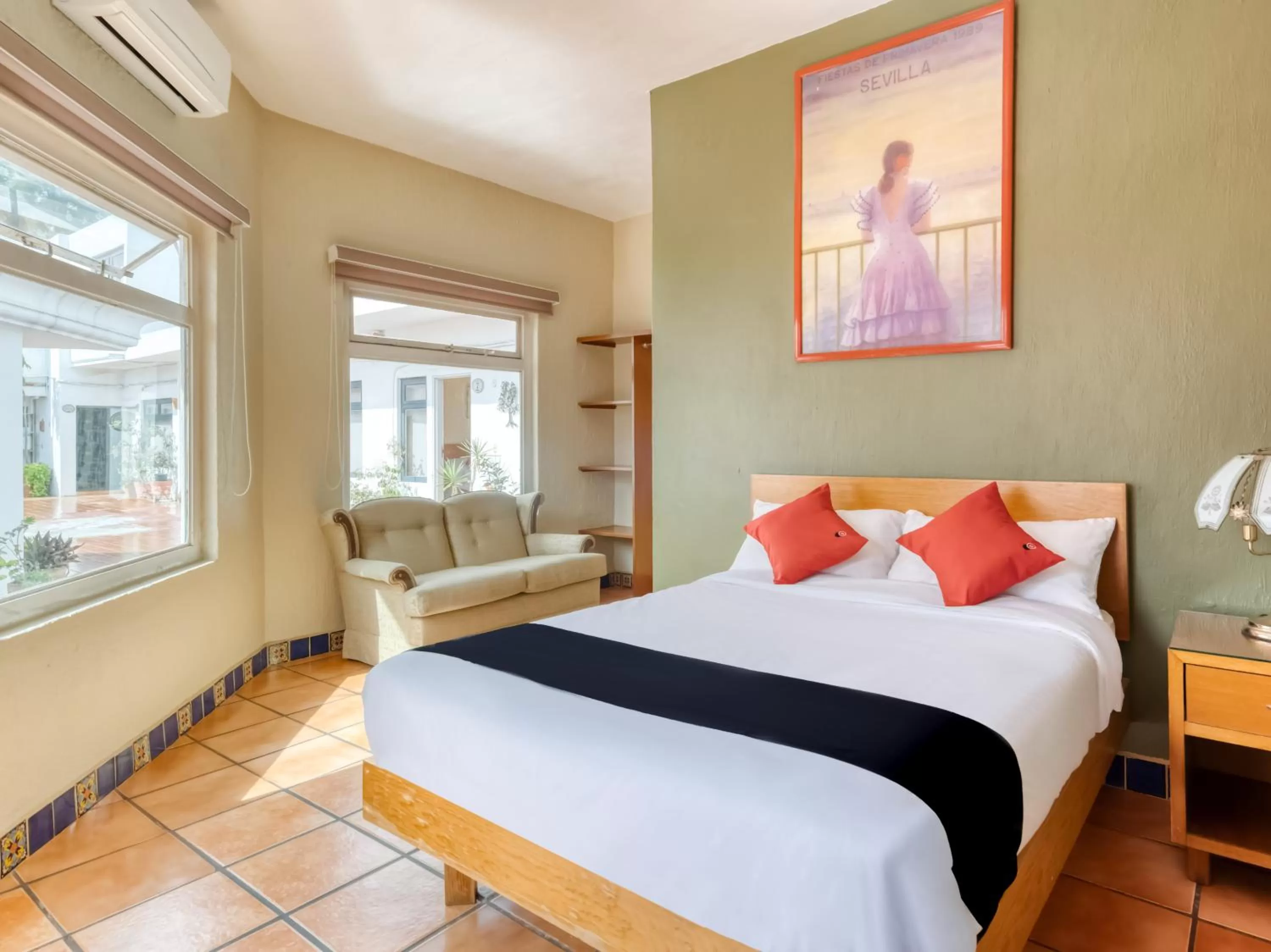 Seating area, Bed in Hotel Arana