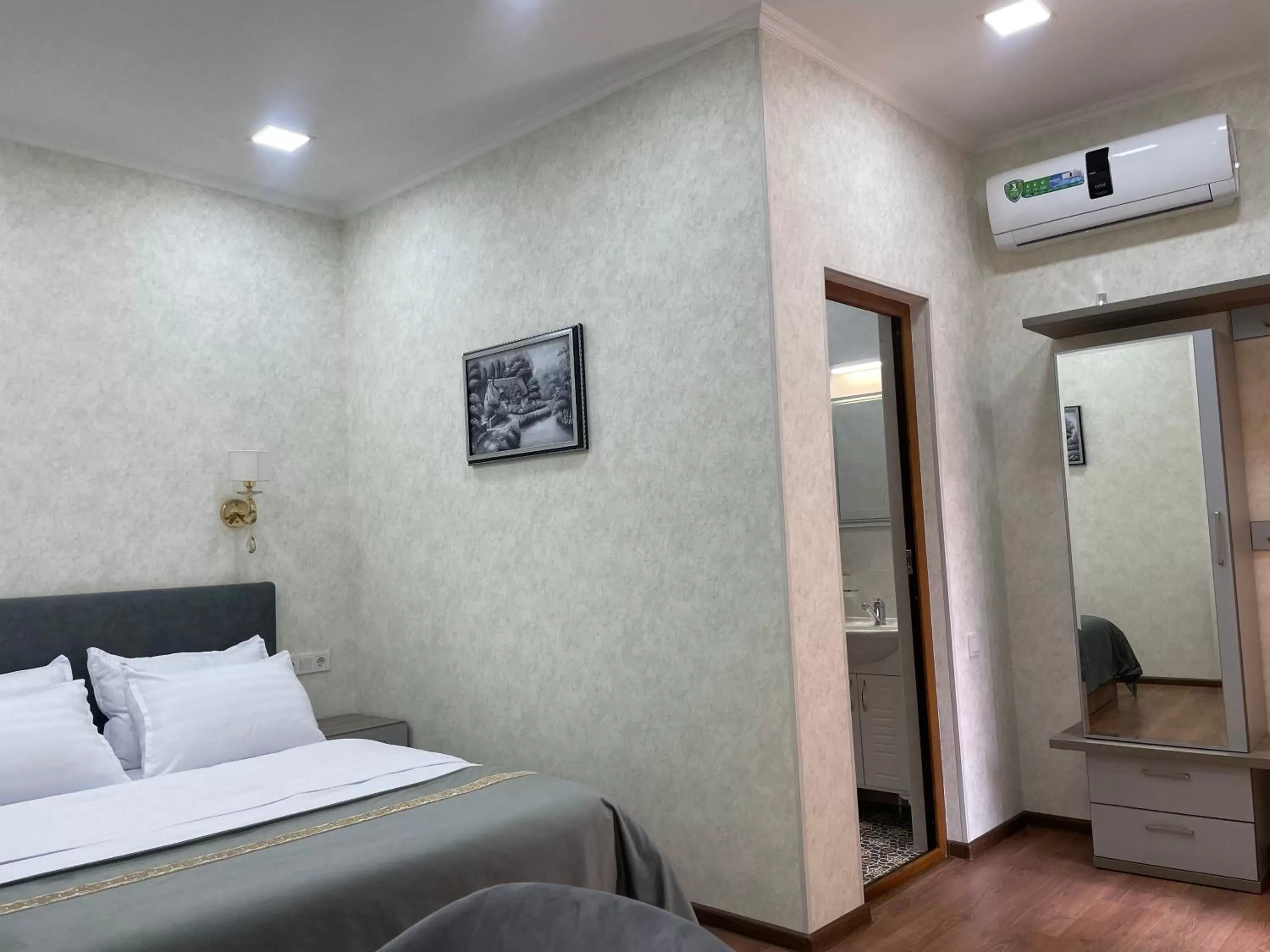 Bed in Registon Saroy Hotel