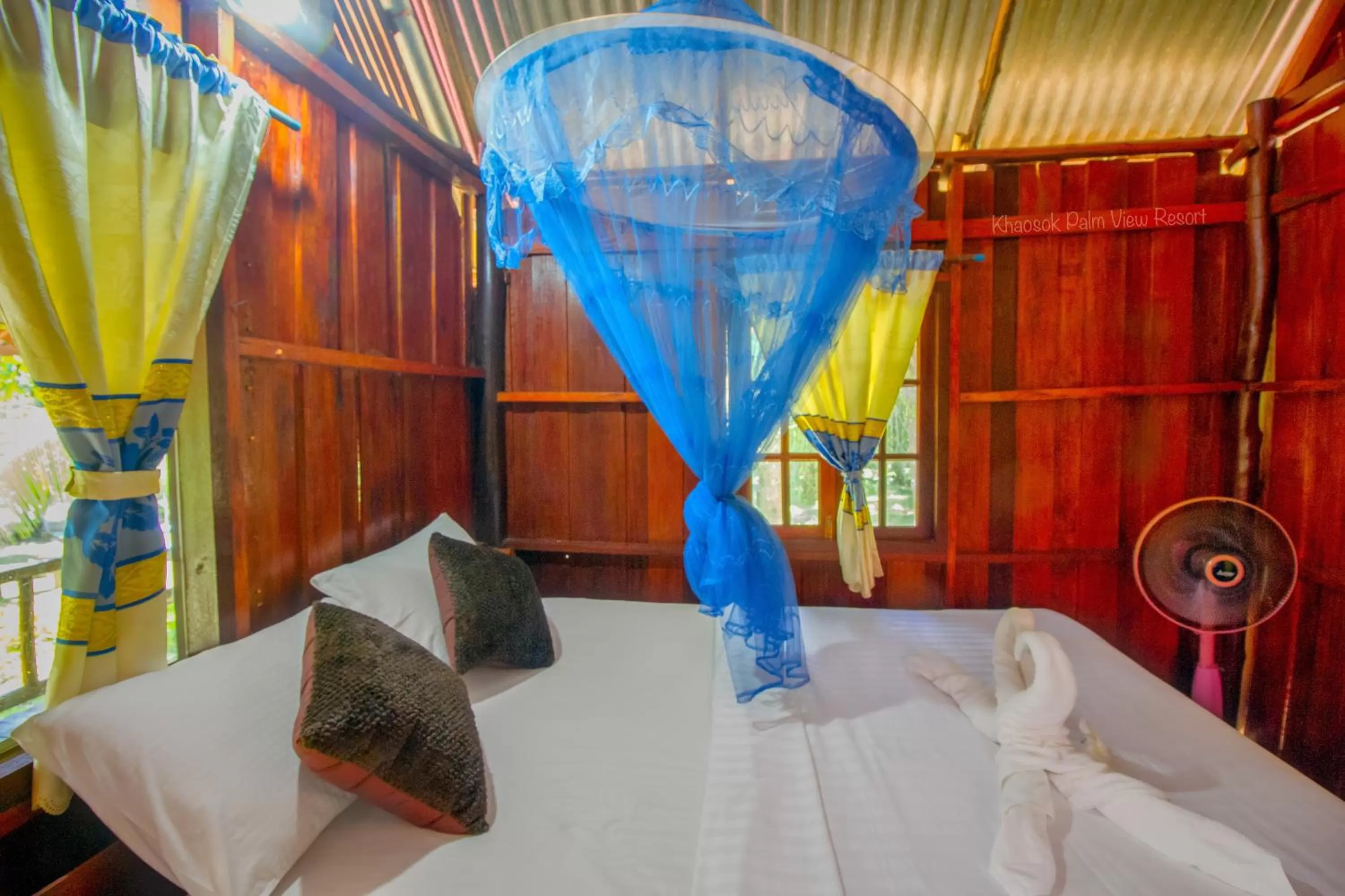 Bed in Khao Sok Palmview Resort