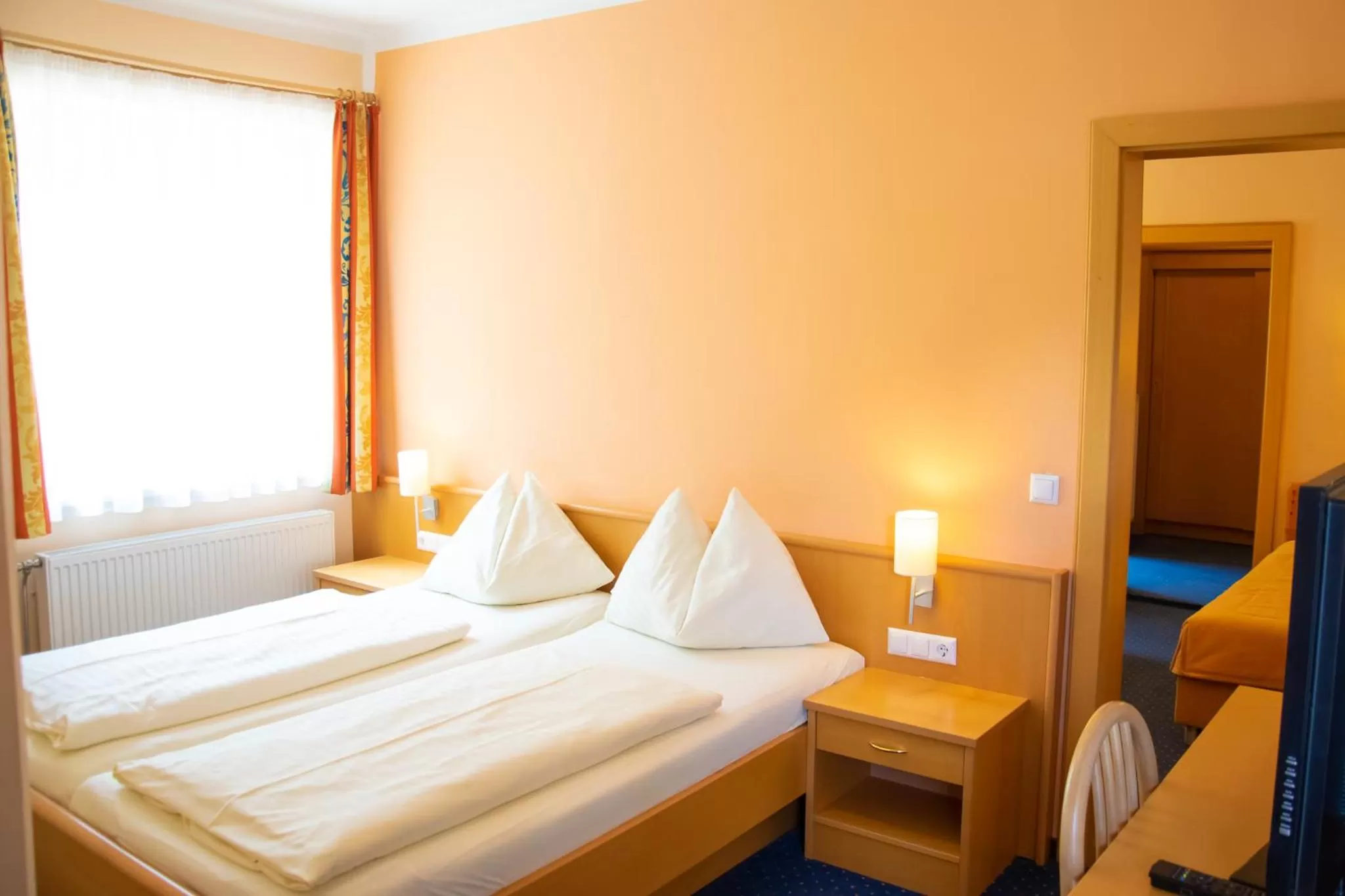 Bed in Strandhotel Burgstaller