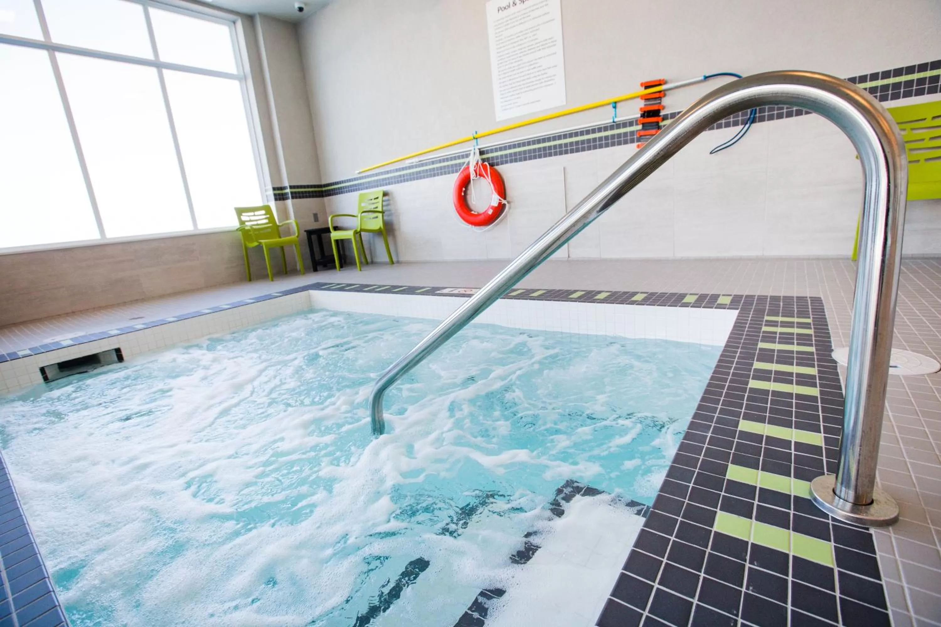 Swimming pool in Holiday Inn Hotel & Suites Calgary South - Conference Ctr by IHG