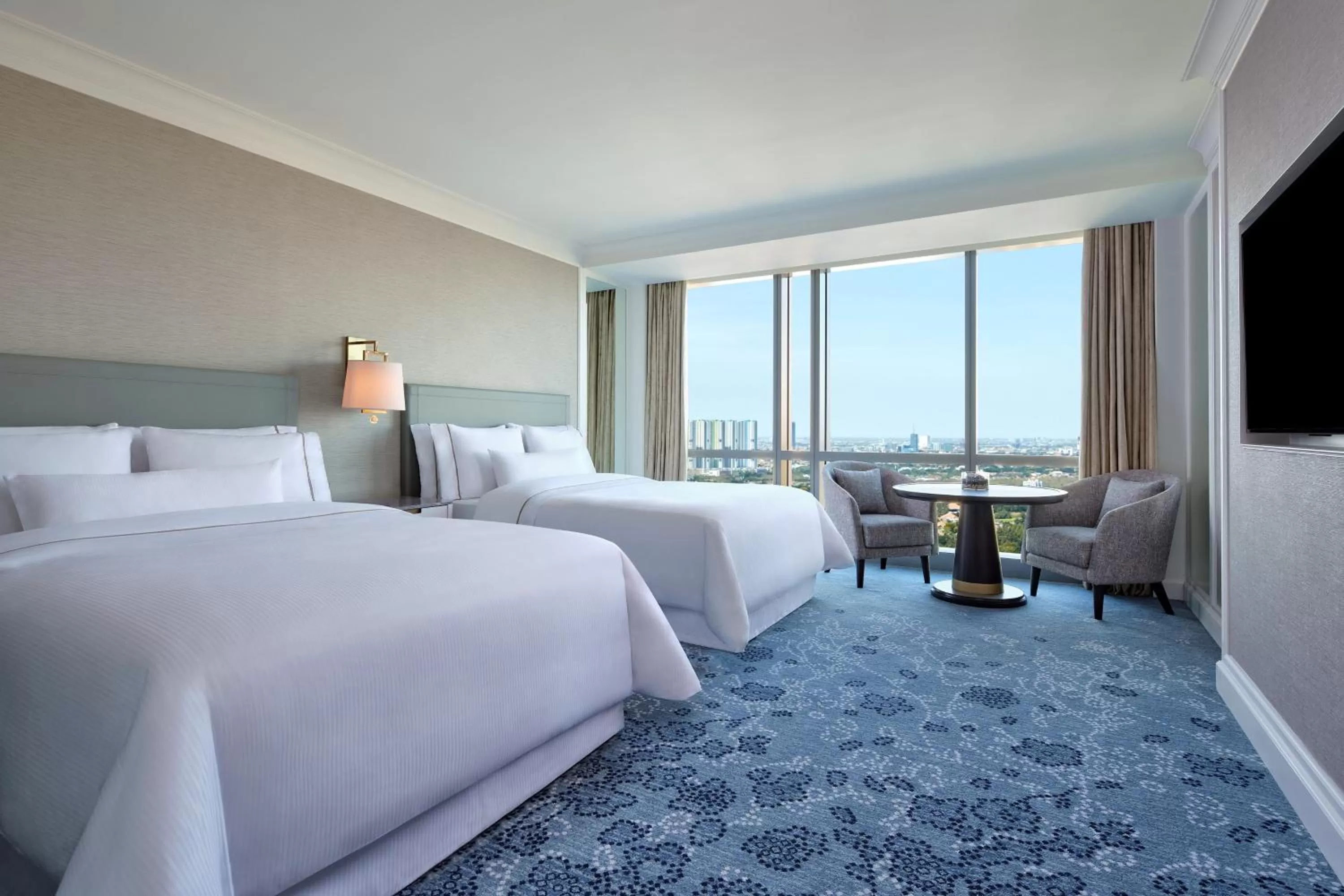 Photo of the whole room, Bed in The Westin Surabaya