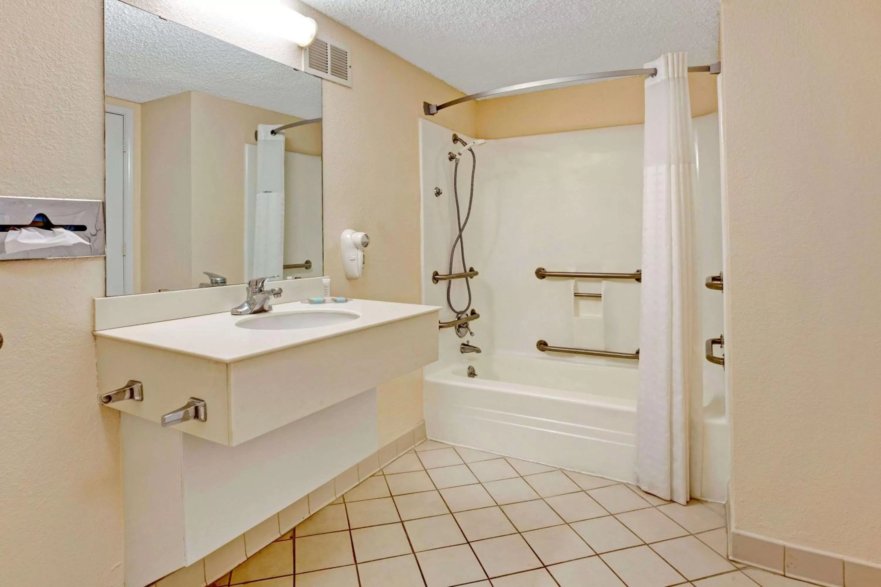 Bathroom in Travelodge by Wyndham North Richland Hills/Dallas/Ft Worth