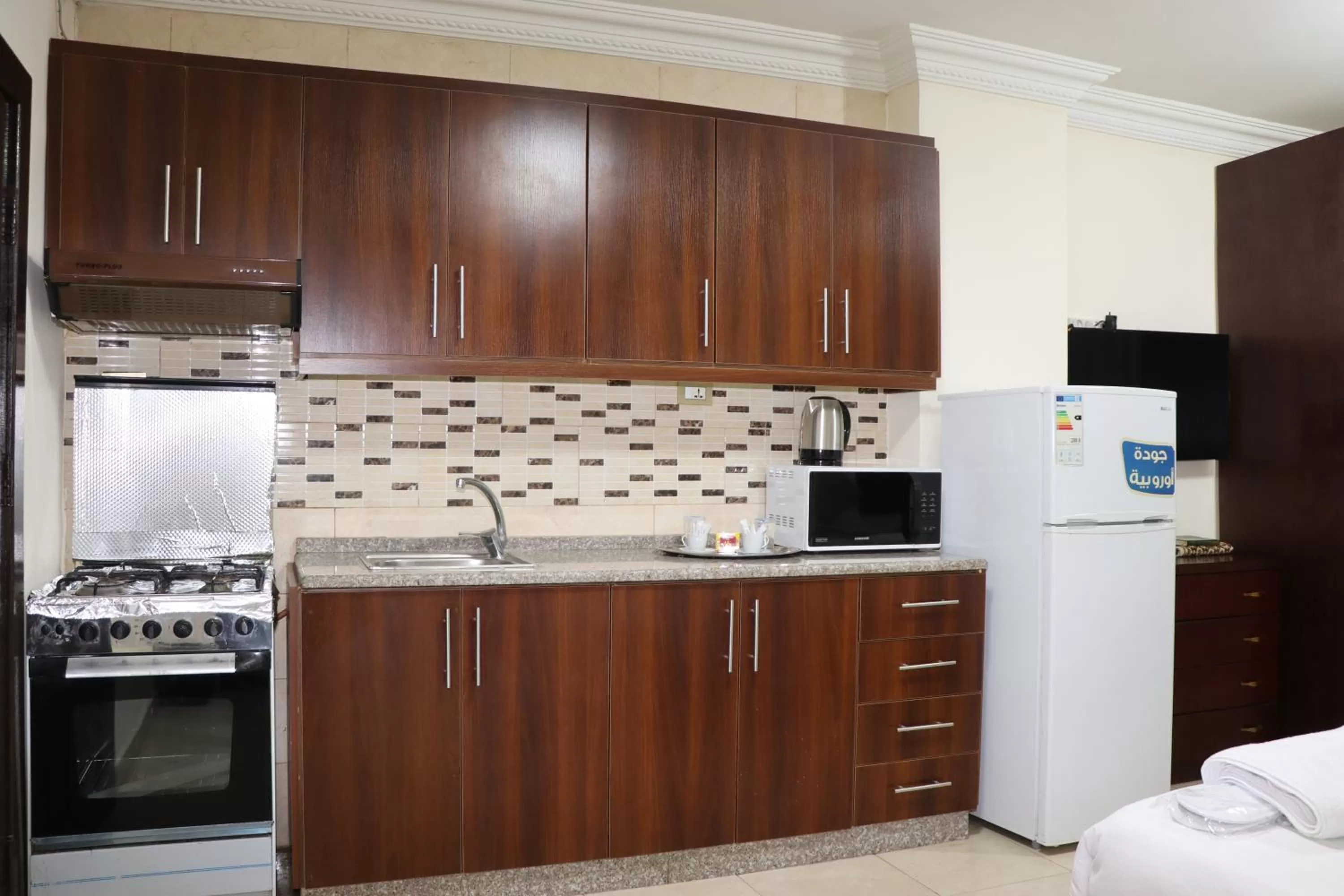 Kitchen/Kitchenette in Al Jamal Suites